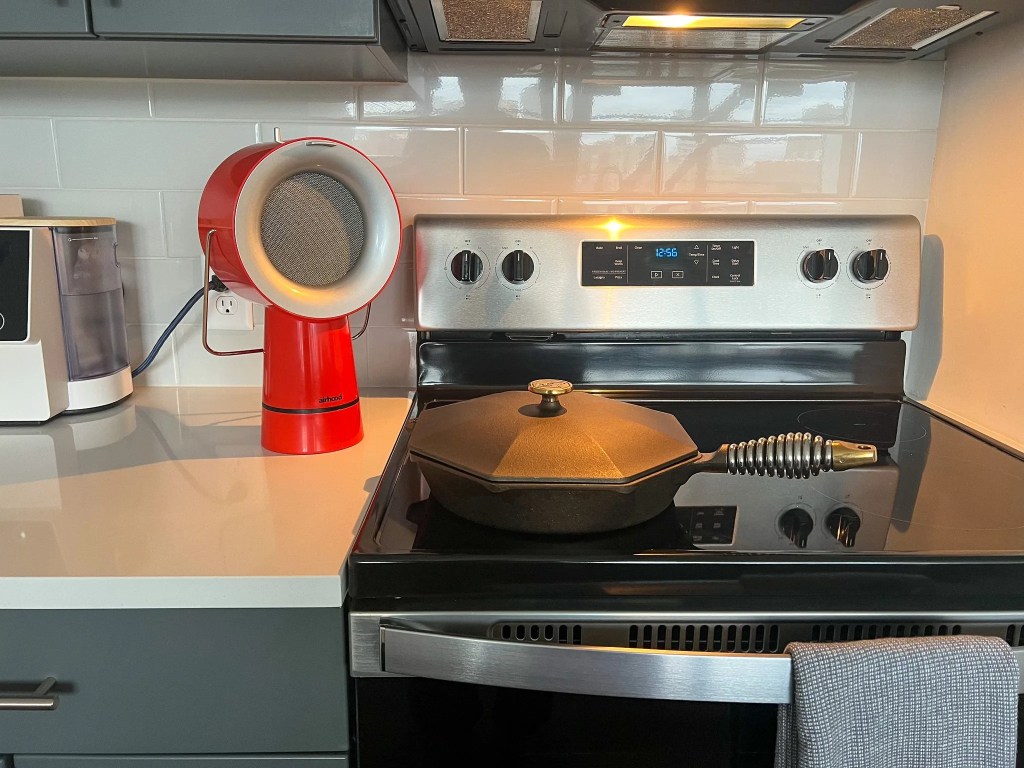 airhood vent on a countertop next to a stove