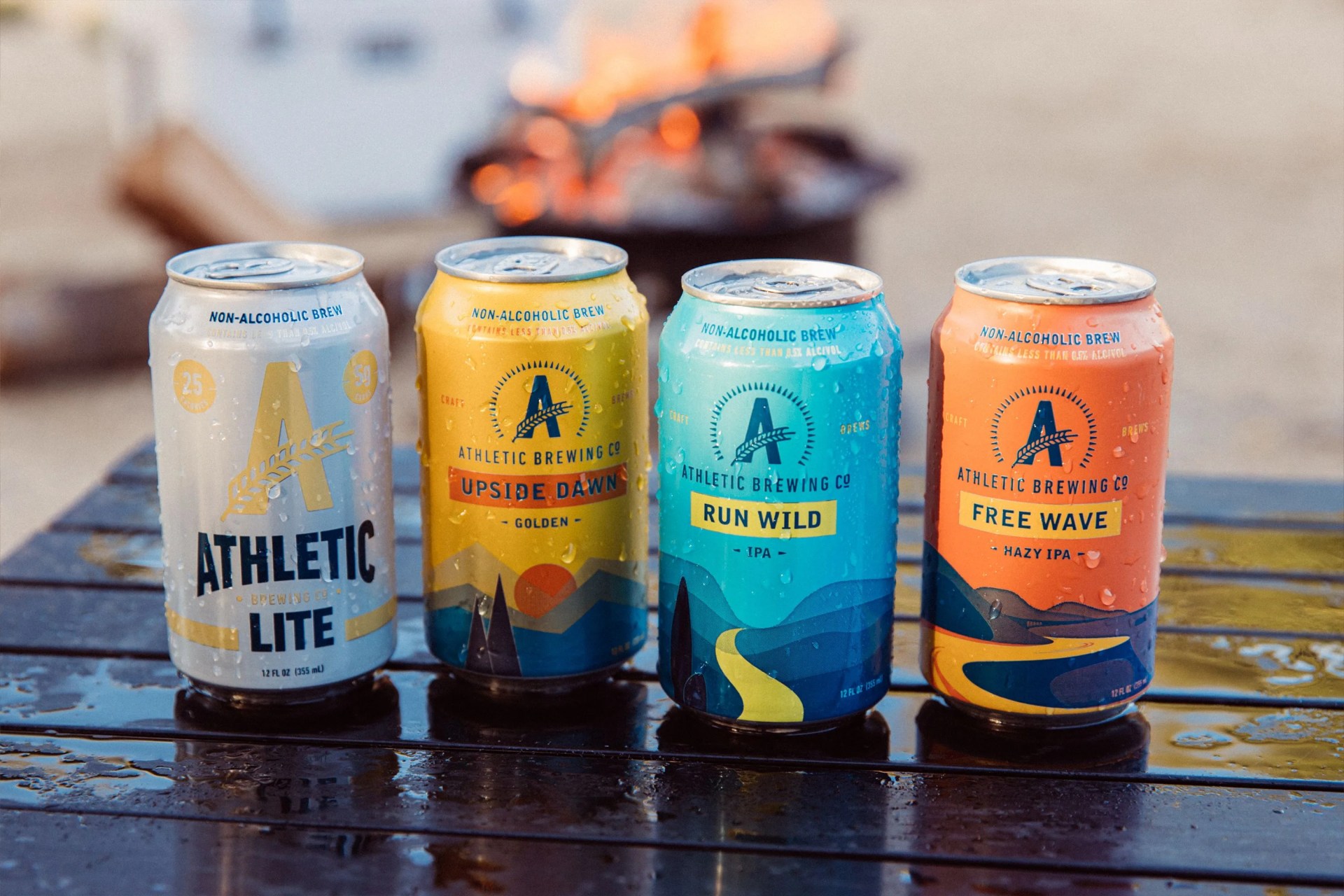 a lineup of athletic beer cans