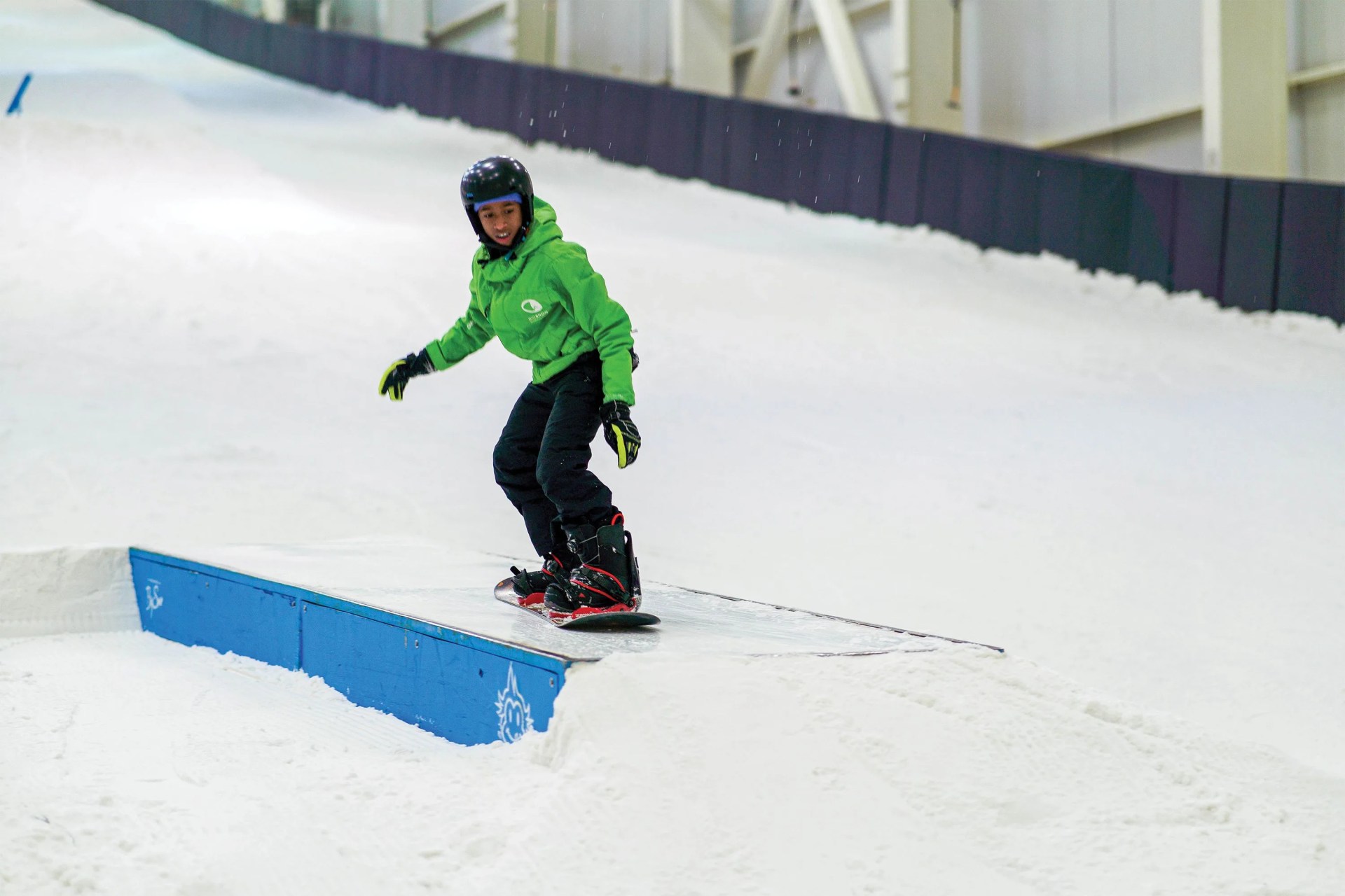 a boy snowboarding