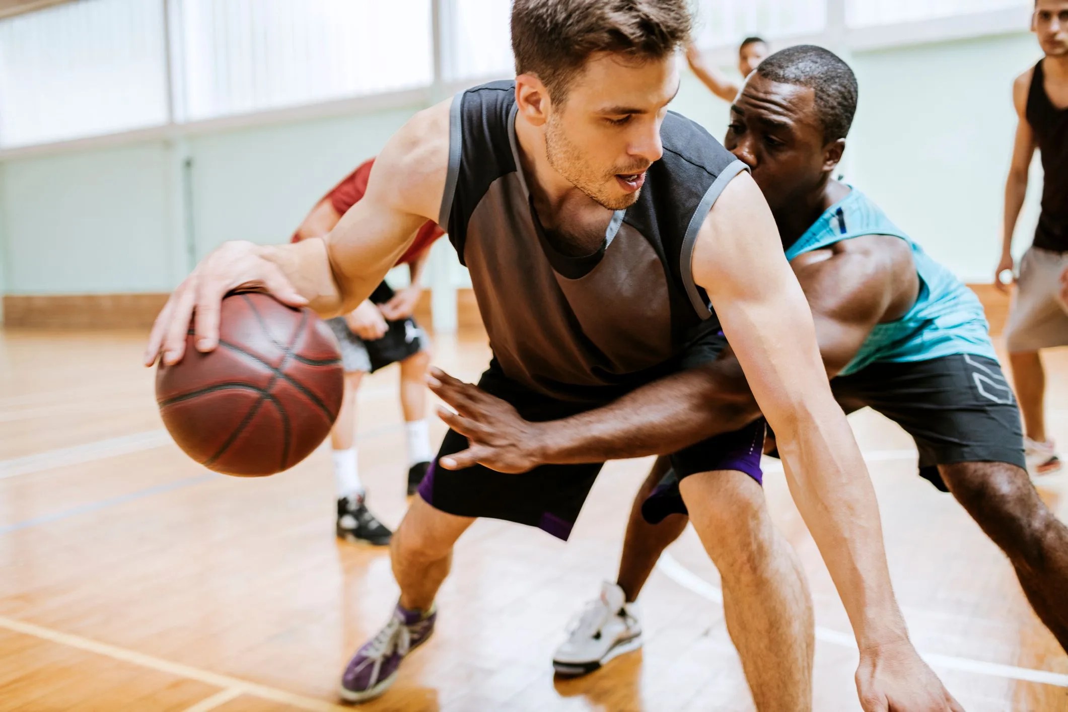group of friends playing basketball