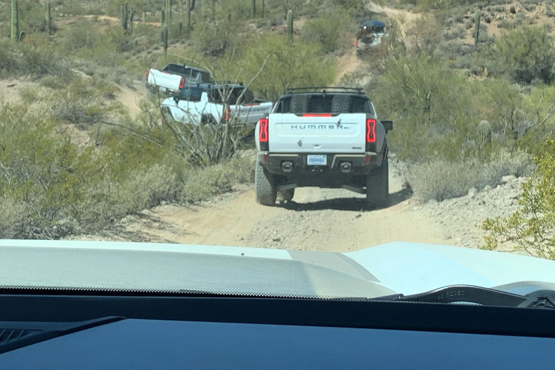 looking at hummer ev suts driving while inside a hummer ev sut