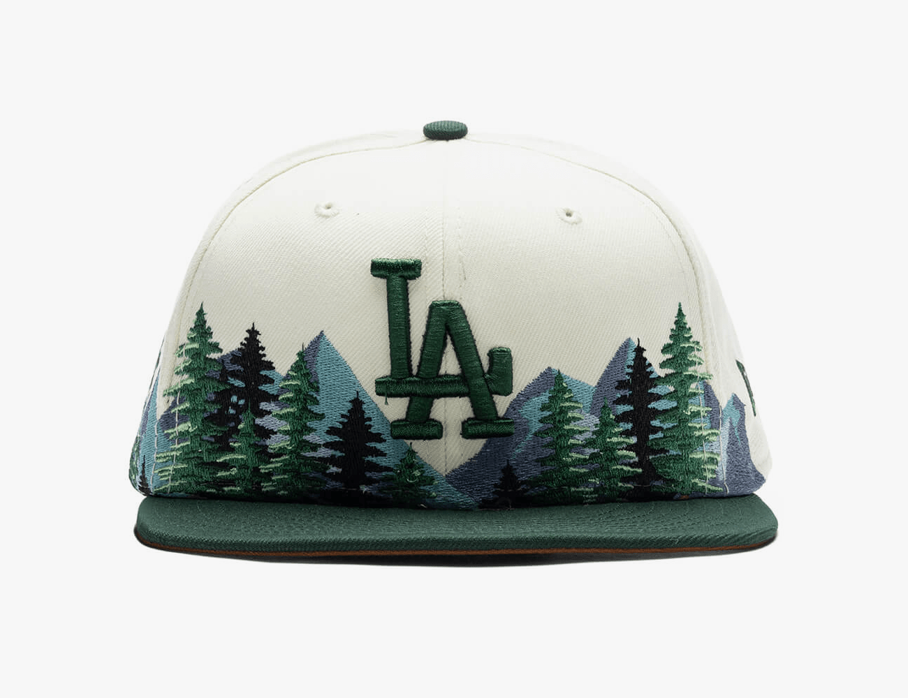 an white hat with trees and the letter la on it