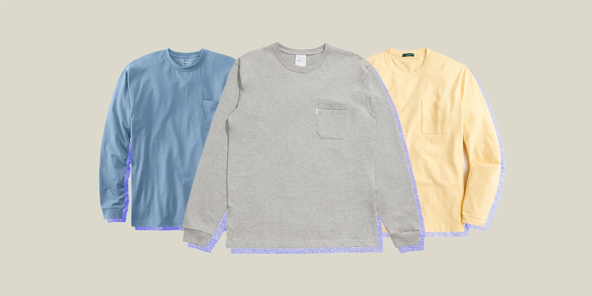 a longsleeve grey shirt laid in front of blue longsleeve shirt and a yellow longsleeve shirt