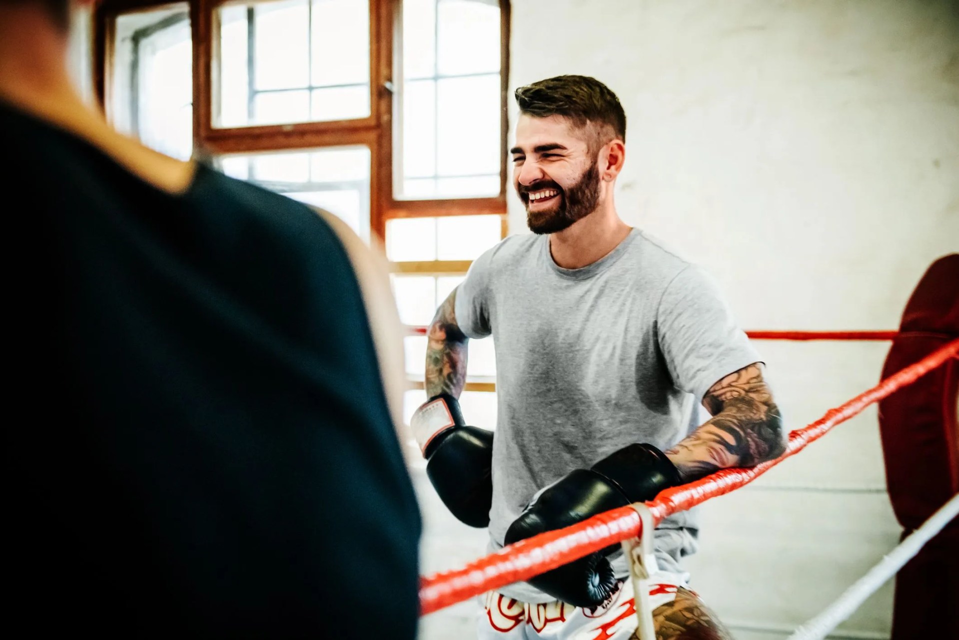 muay thai boxing athletes standing in boxing ring