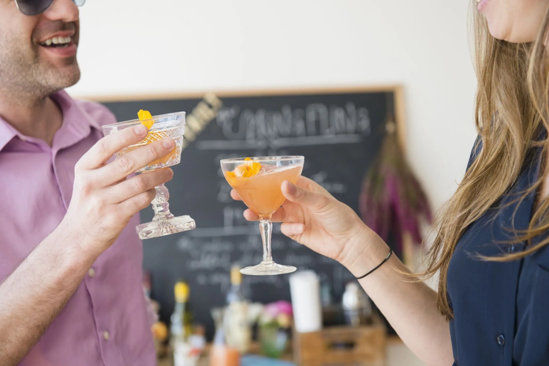 usa, new jersey, jersey city, couple toasting at party