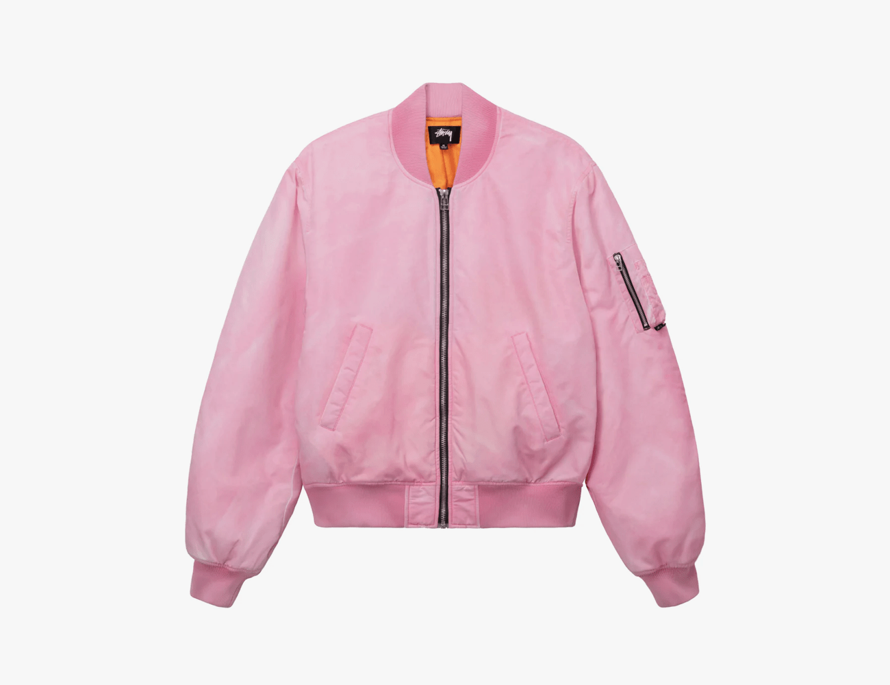 a pink bomber jacket with orange lining