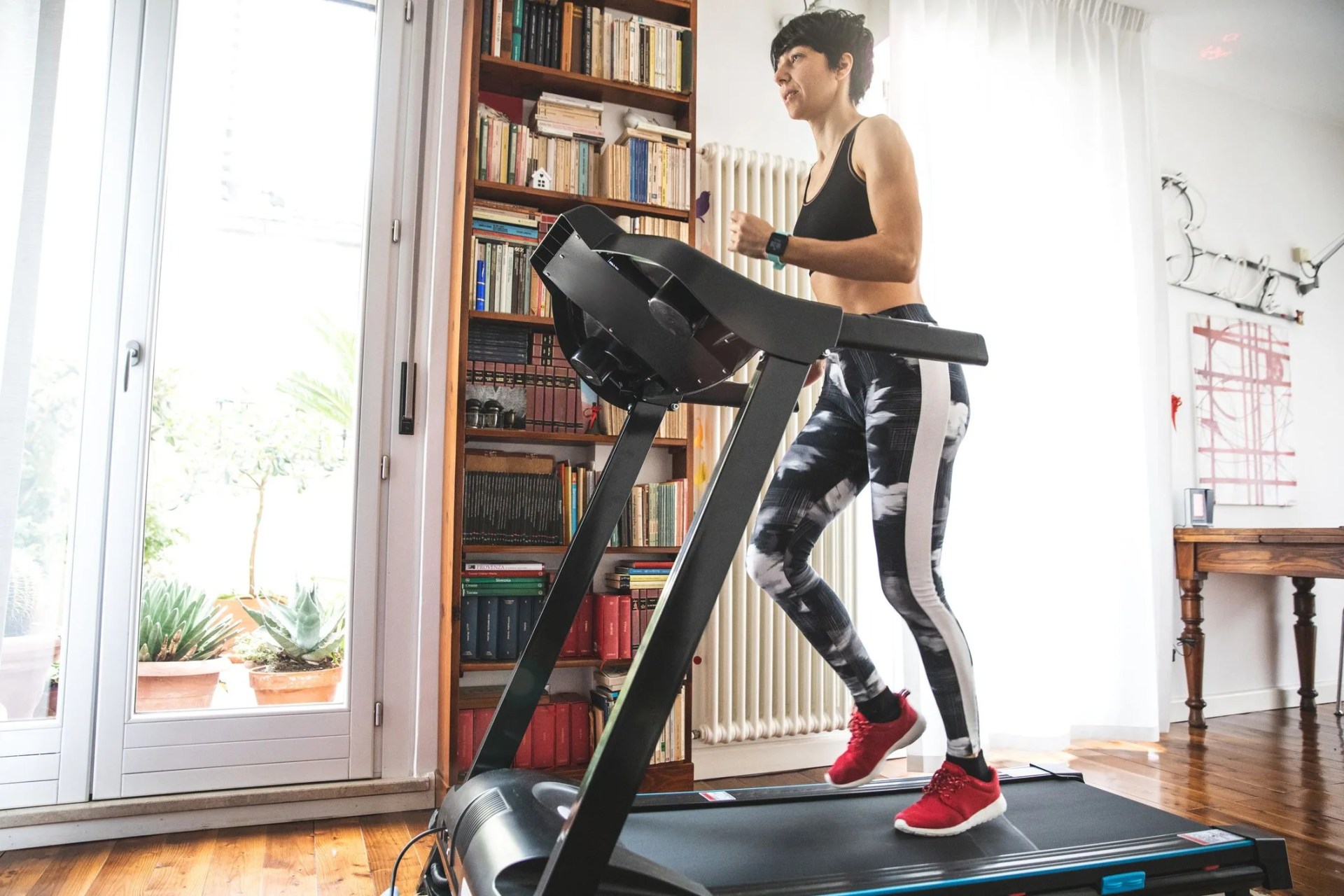 woman getting fit and doing home training in the living room