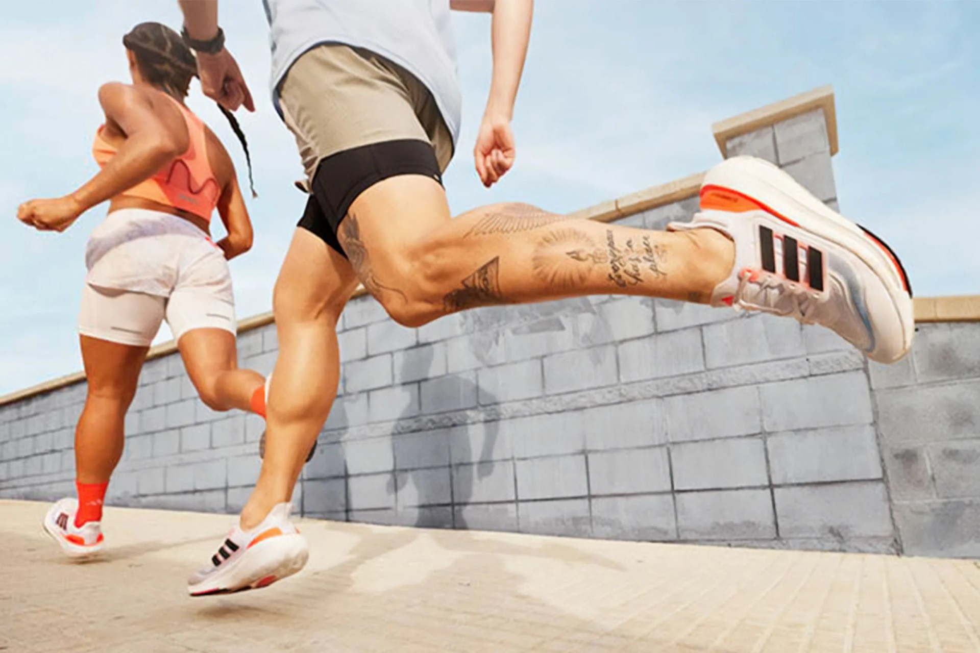two people running