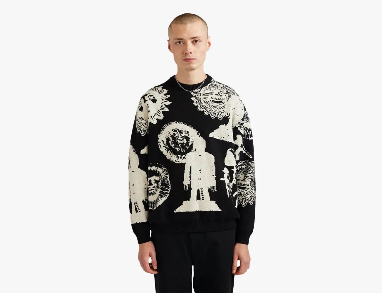 a person wearing a black and white sweater
