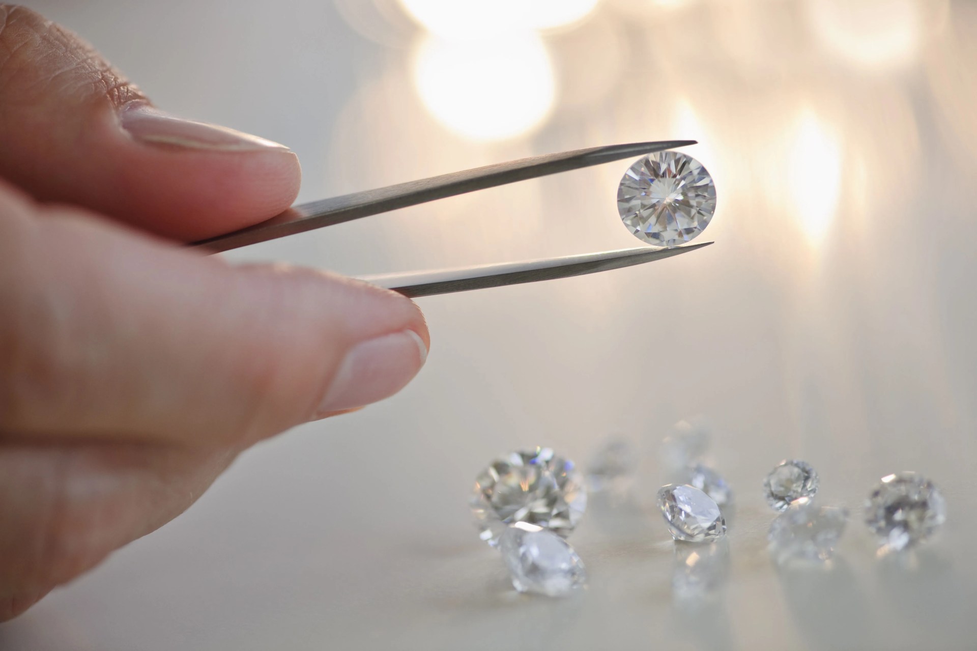 diamond in tweezers
