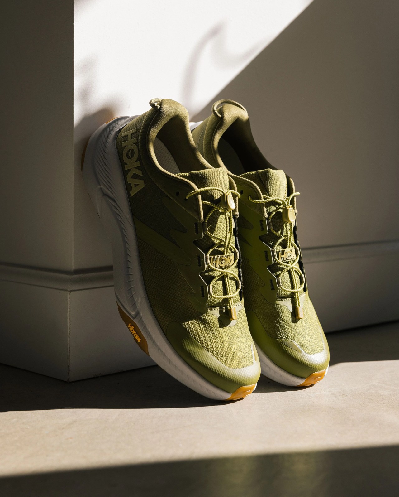 hoka transport sneakers