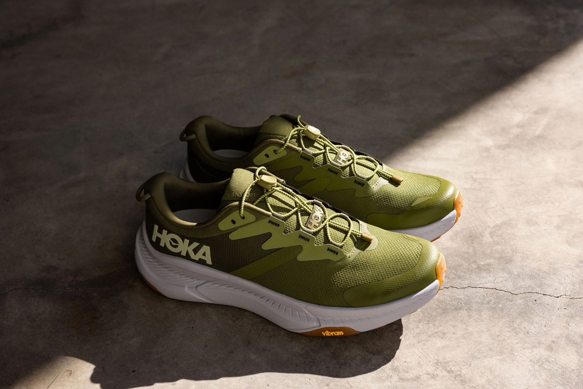 hoka transport sneakers