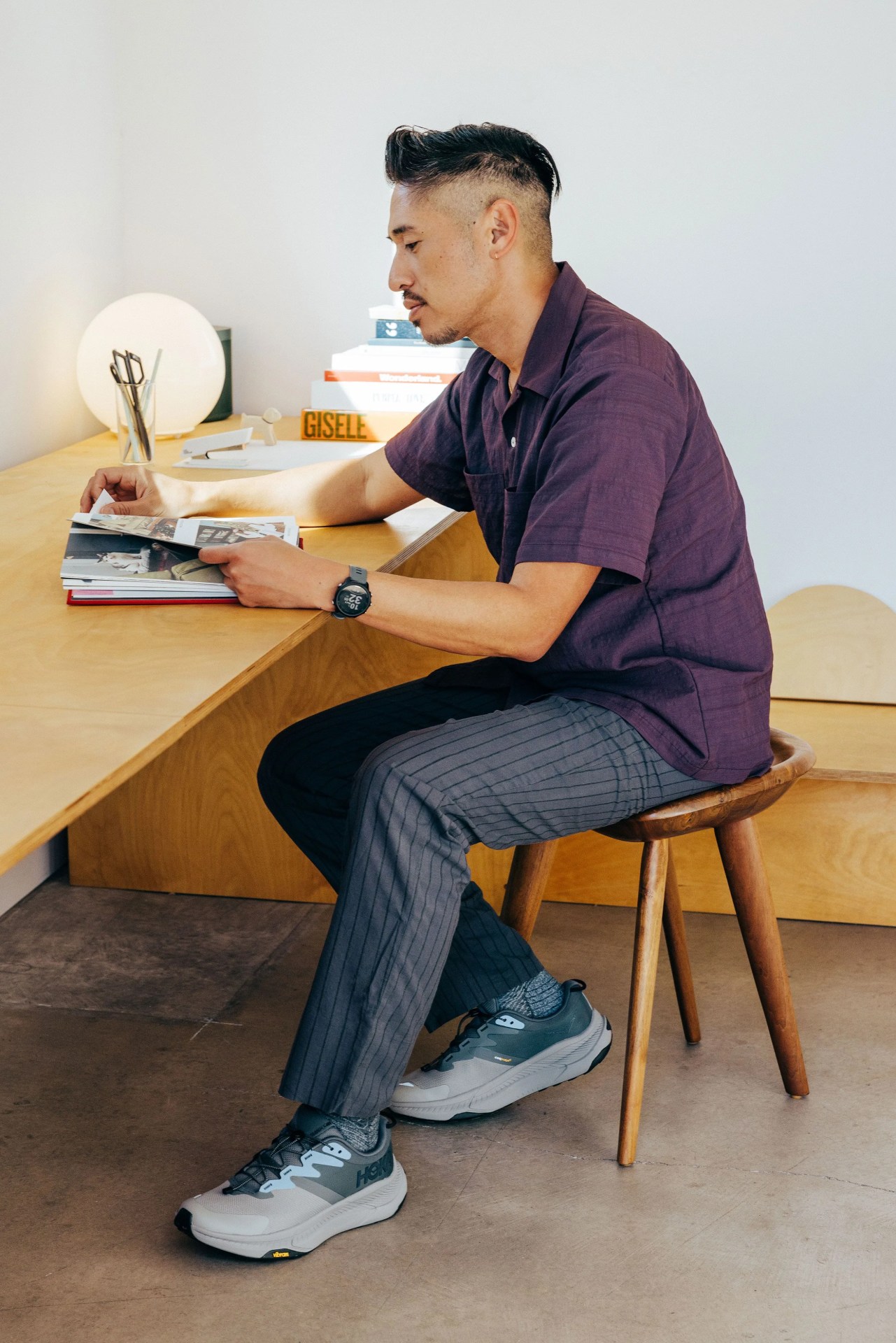 ja tecson wearing hoka transport sneakers