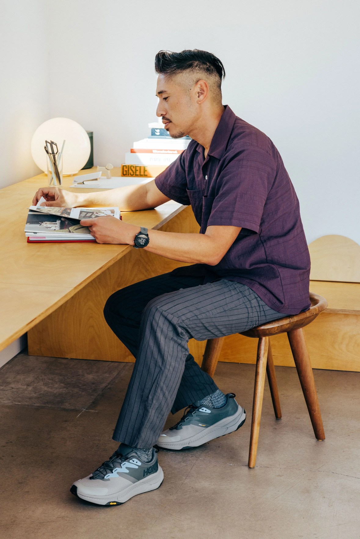 ja tecson wearing hoka transport sneakers