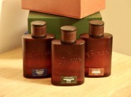 dr squatch colognes arranged on a desk