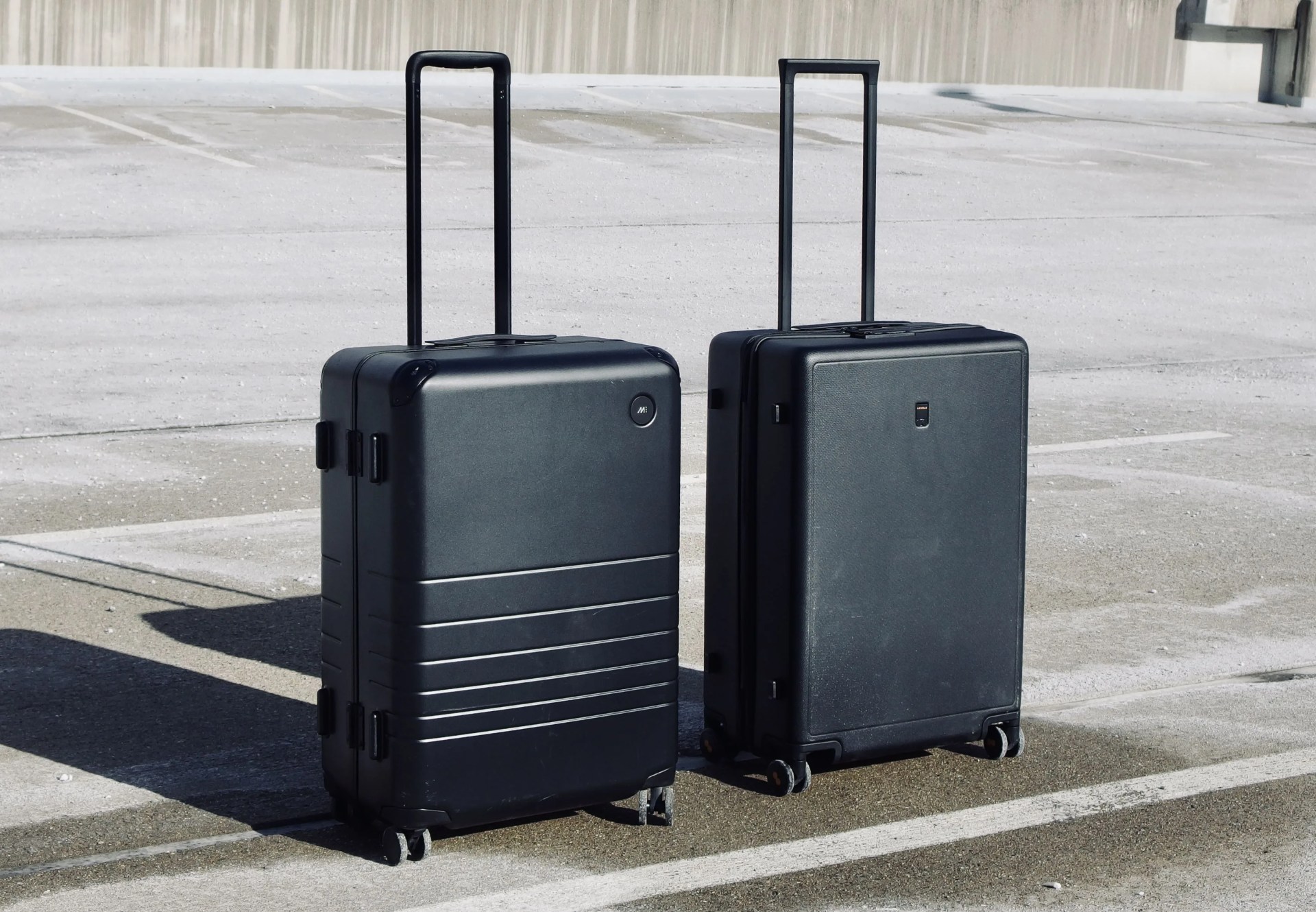 two suitcases positioned alongside each other
