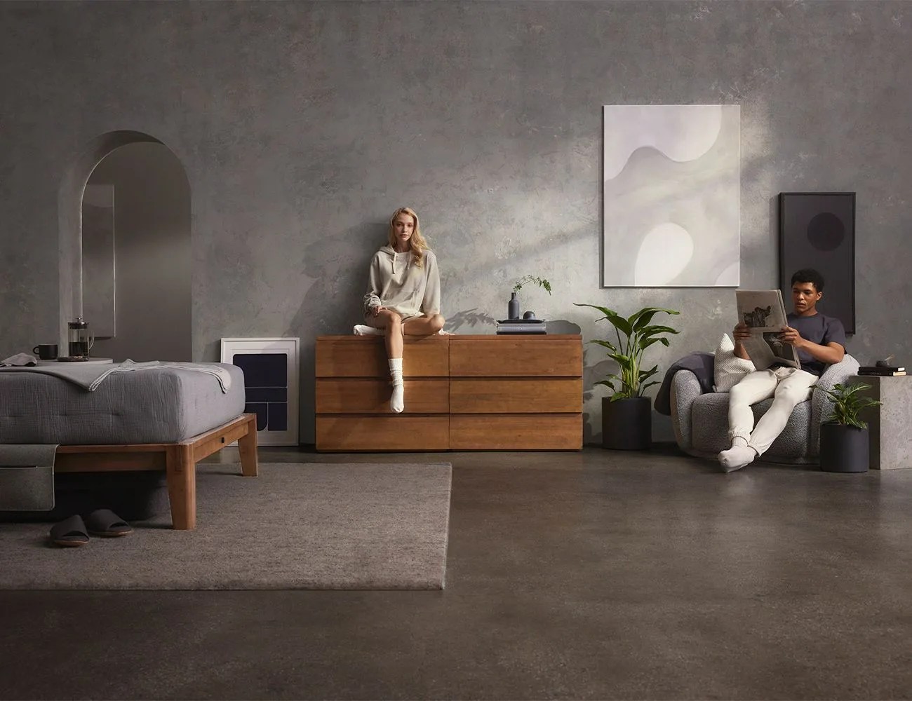 woman sitting on a dresser