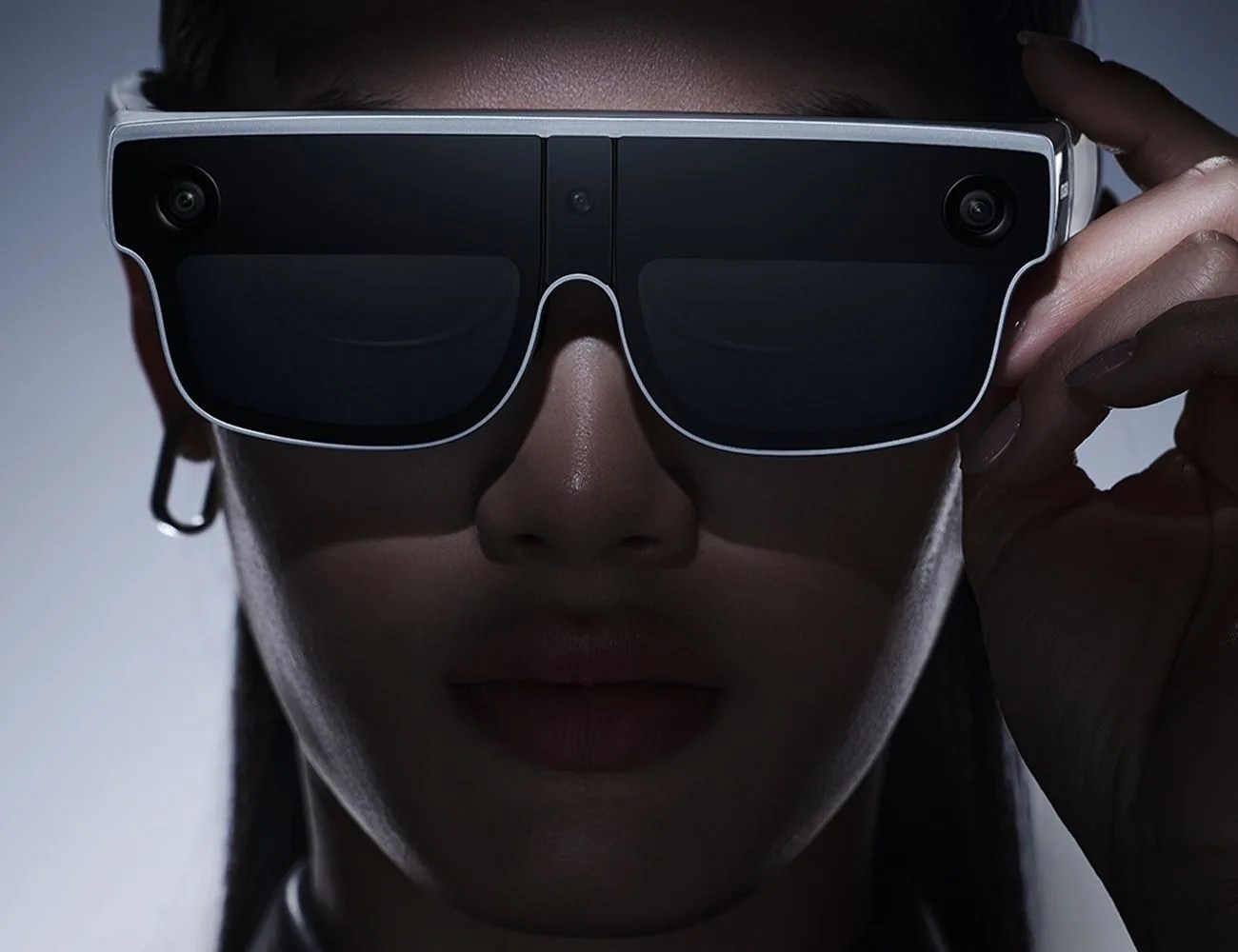 a woman wearing smart glasses