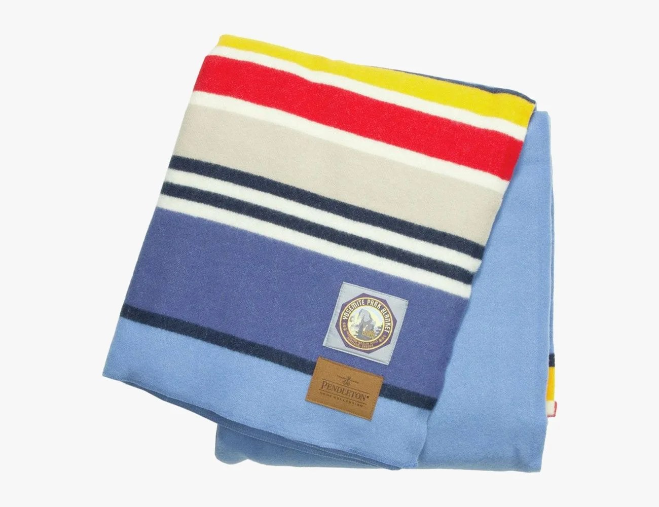 a folded blanket with multiple colors