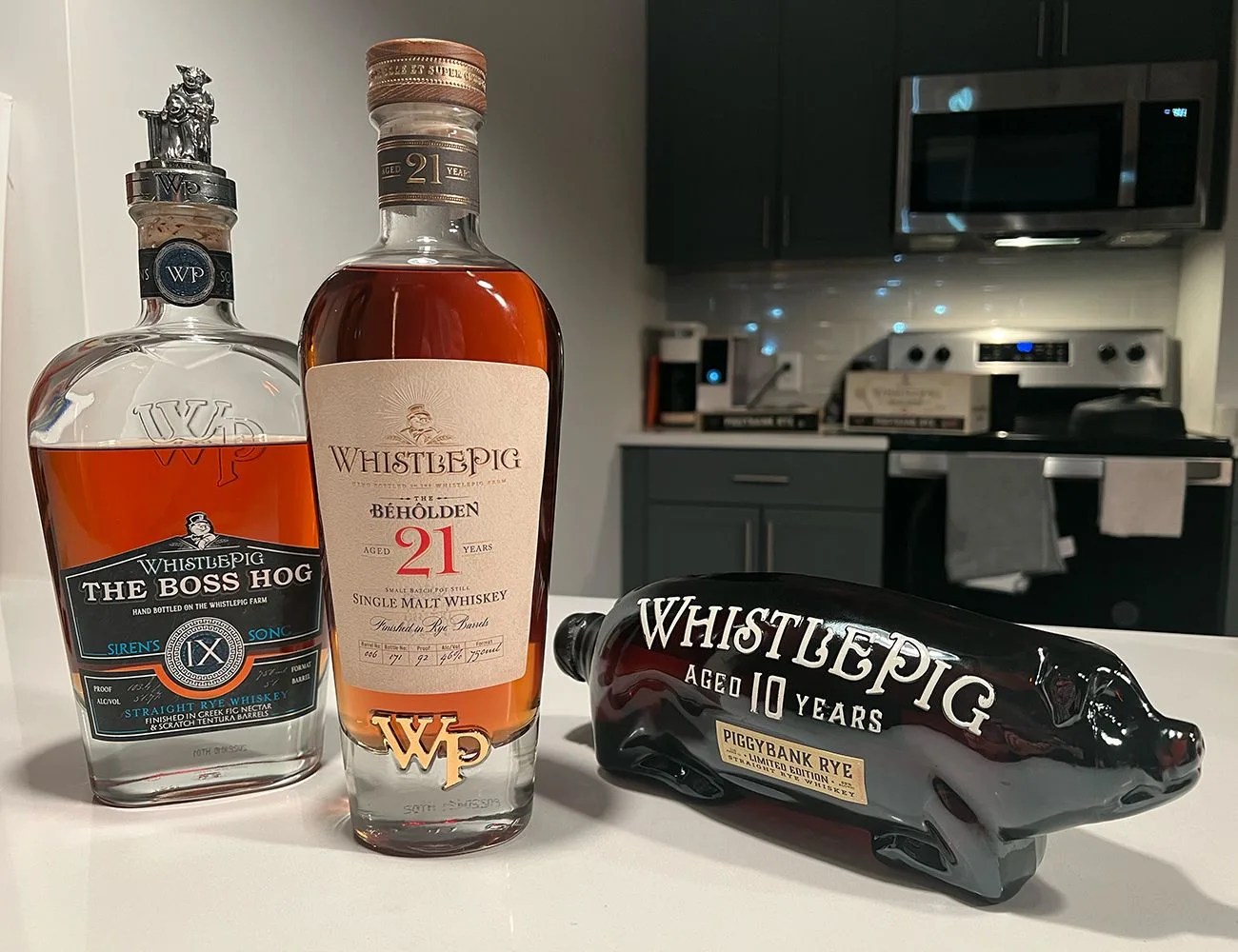 bottles of whistlepig whiskey on a counter