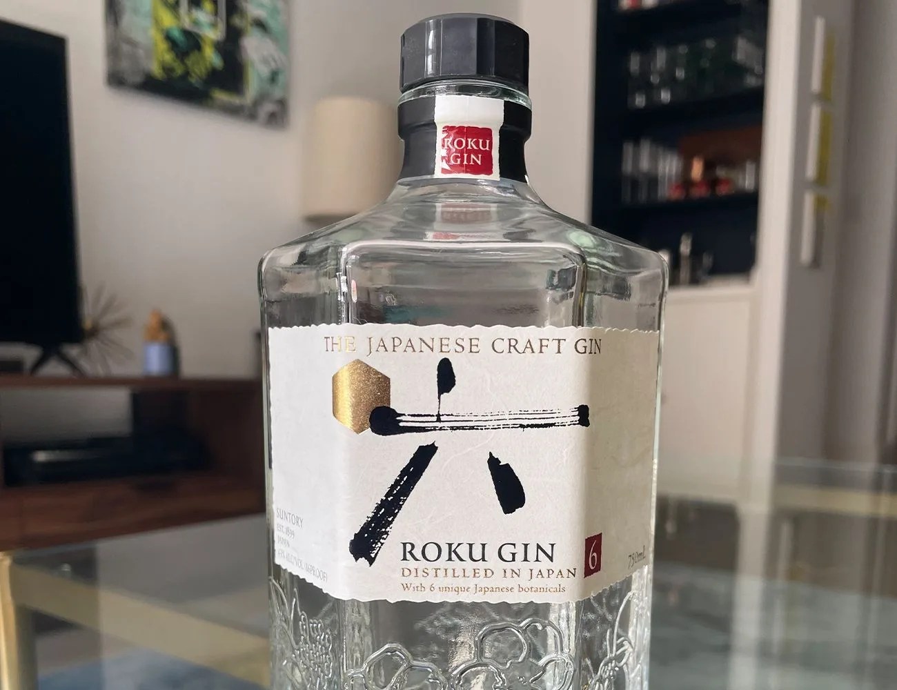 a bottle of gin on a table
