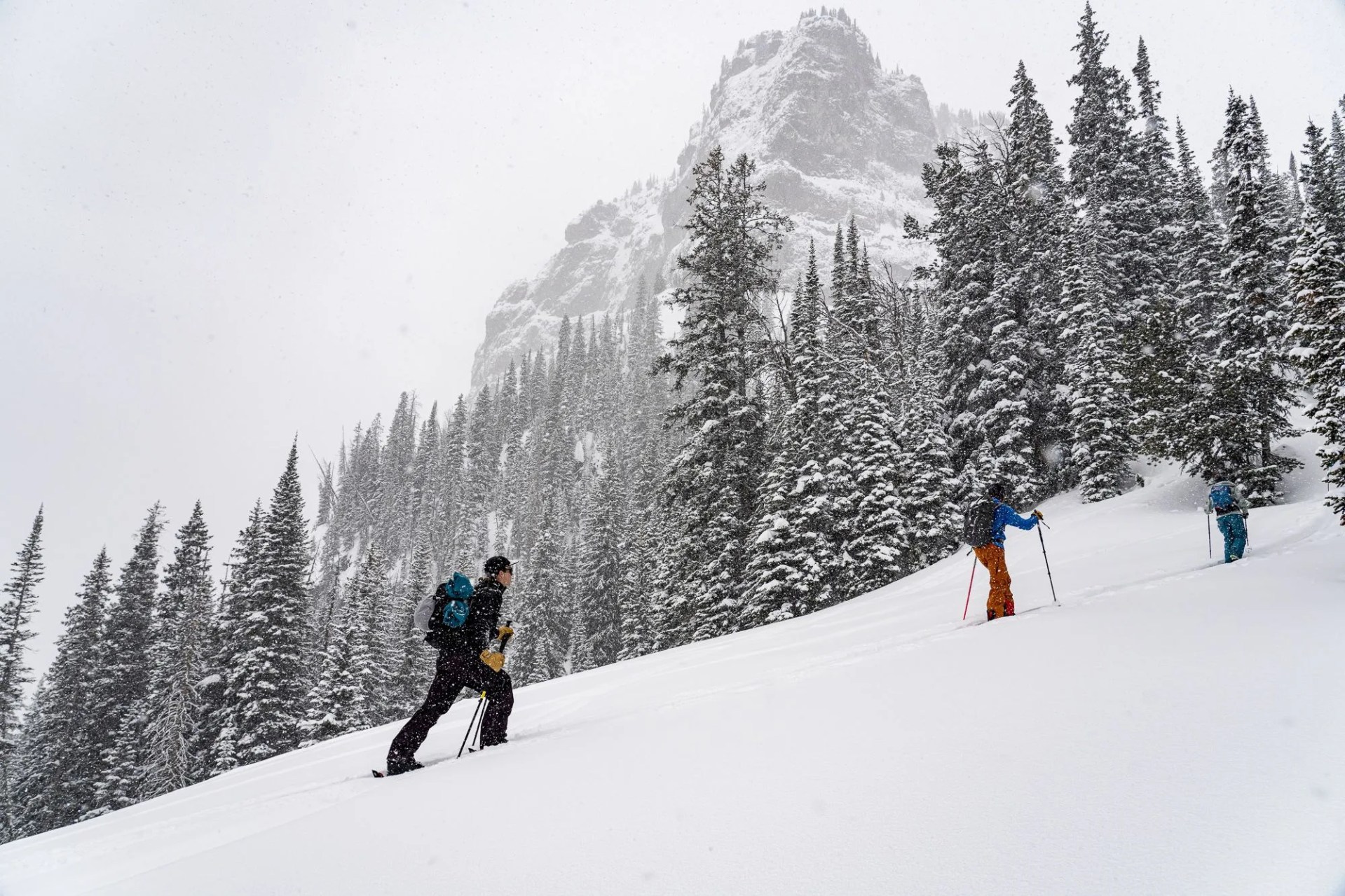 patagonia and gore tex press event celebrating a partnership in developing products made with epe membrane that are guarunteed to hold up to the harsh demands of outdoor, alpine and backcountry objectives with out harmful long lasting pfcs perfluorinated chemicals hyalite canyon, montana pep fujas follows pasha whitmire and bridgid mander on a snowy skin track products untracked jacket and bibs