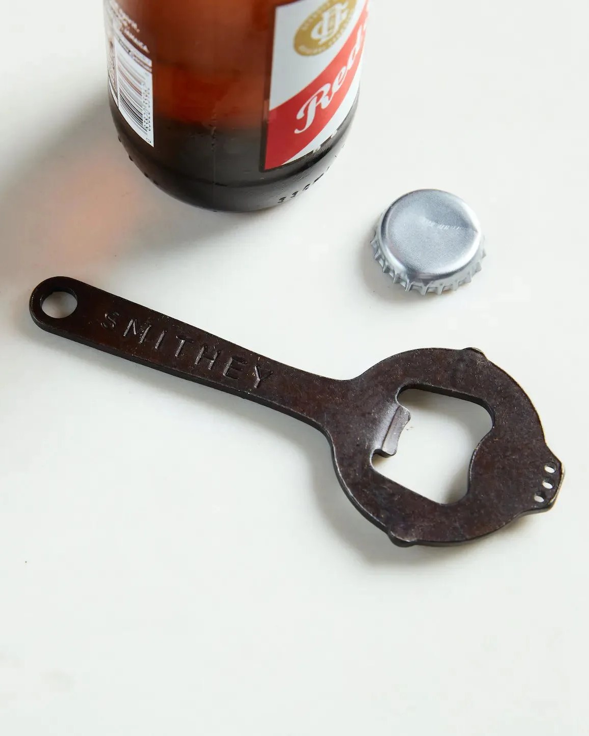 smithey ironware co cast iron bottle opener in cast iron