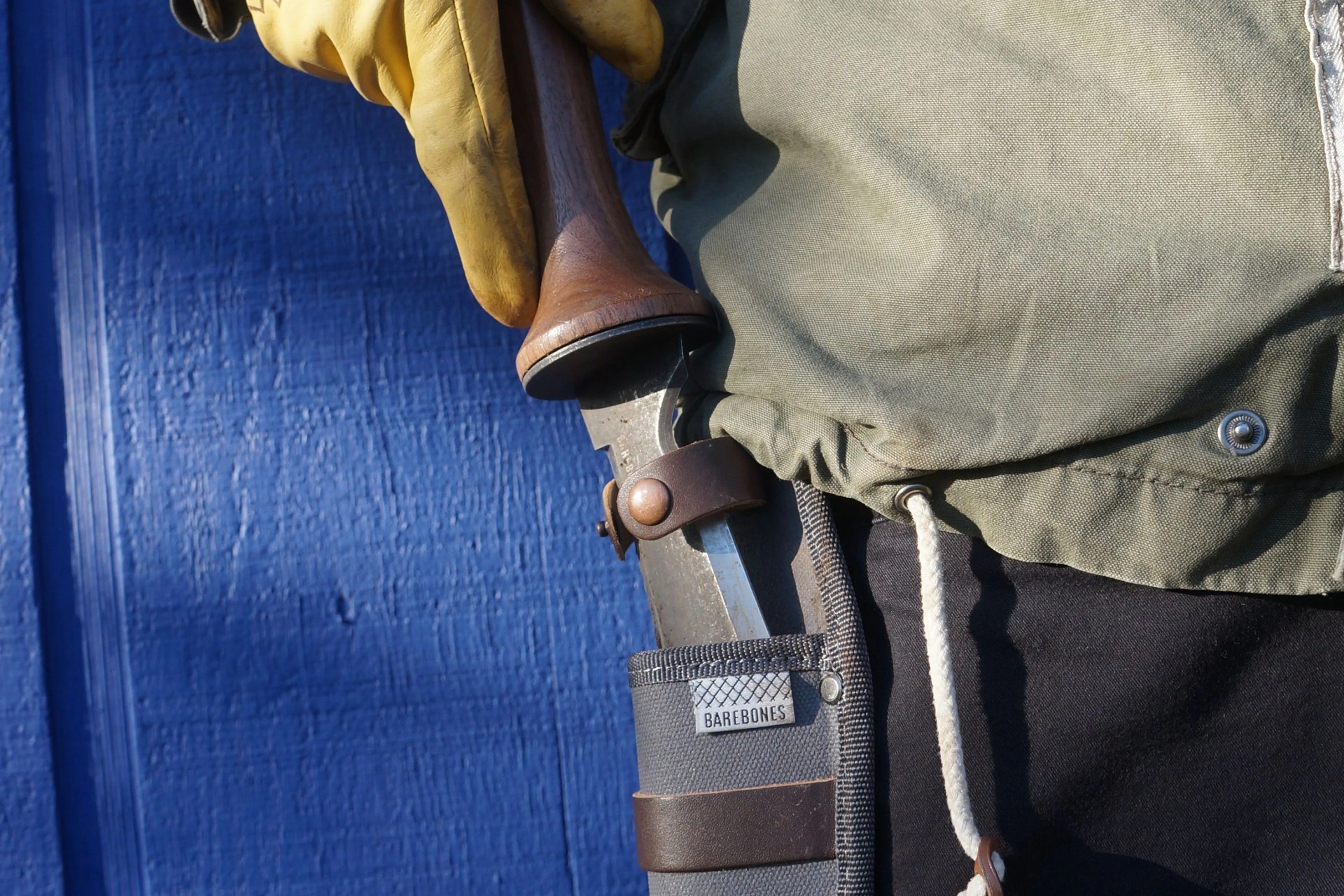 a garden knife in a belt loop sheath