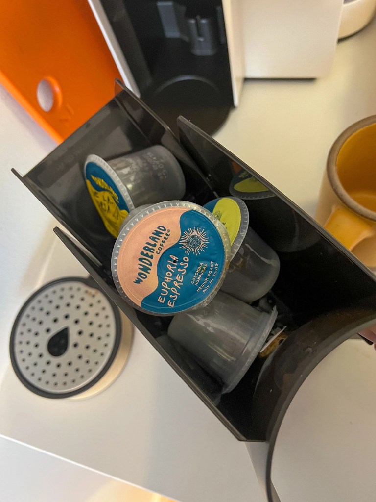 bruvi coffee pods in the discarded bruvi pod container