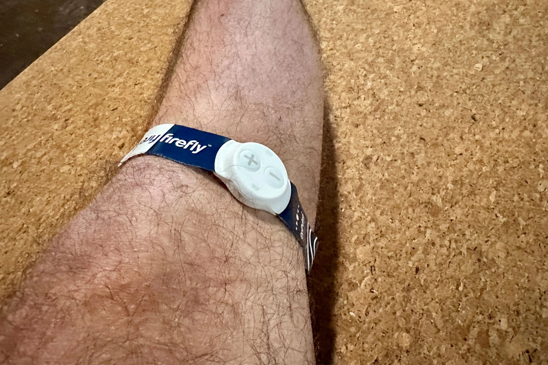 a firefly portable recovery device on a man's leg