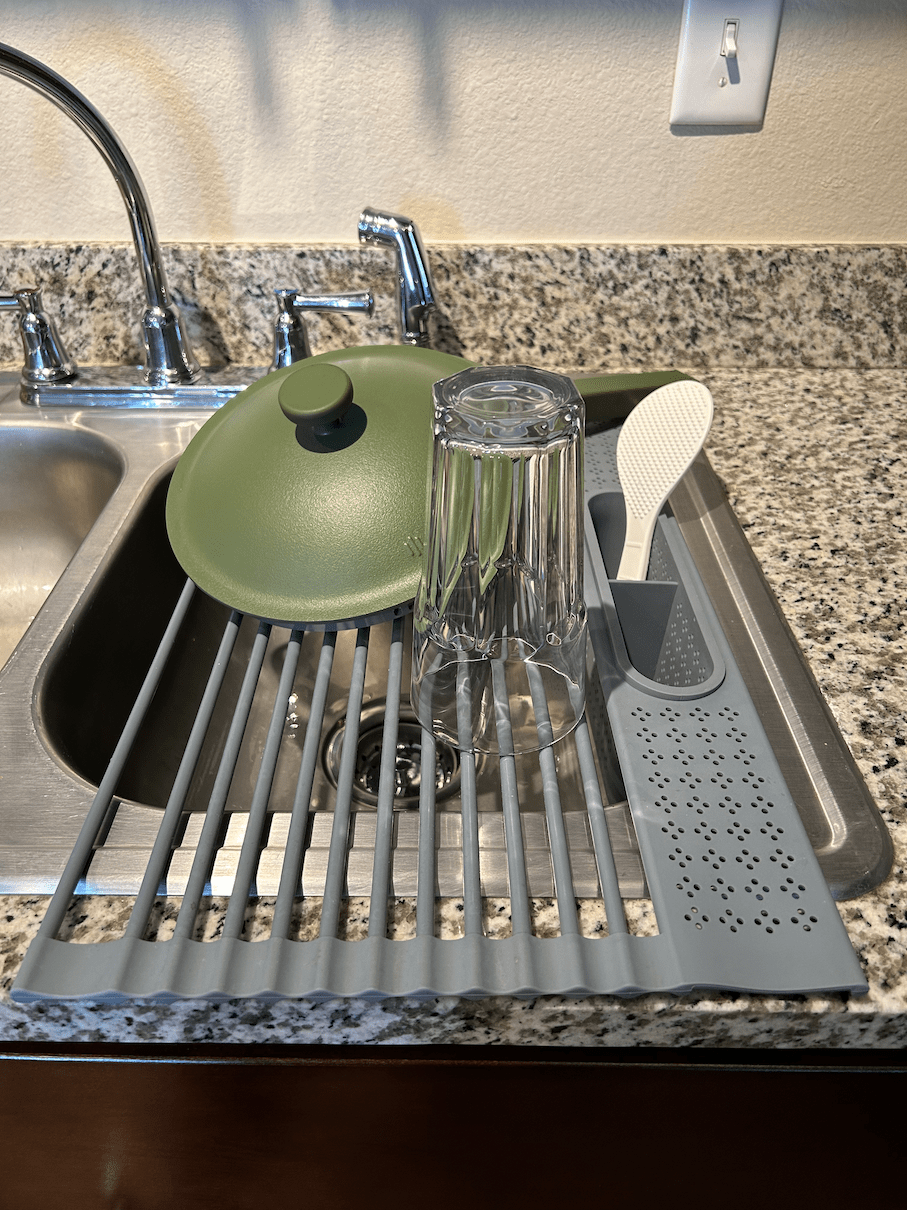 over sink dish rack with dishes