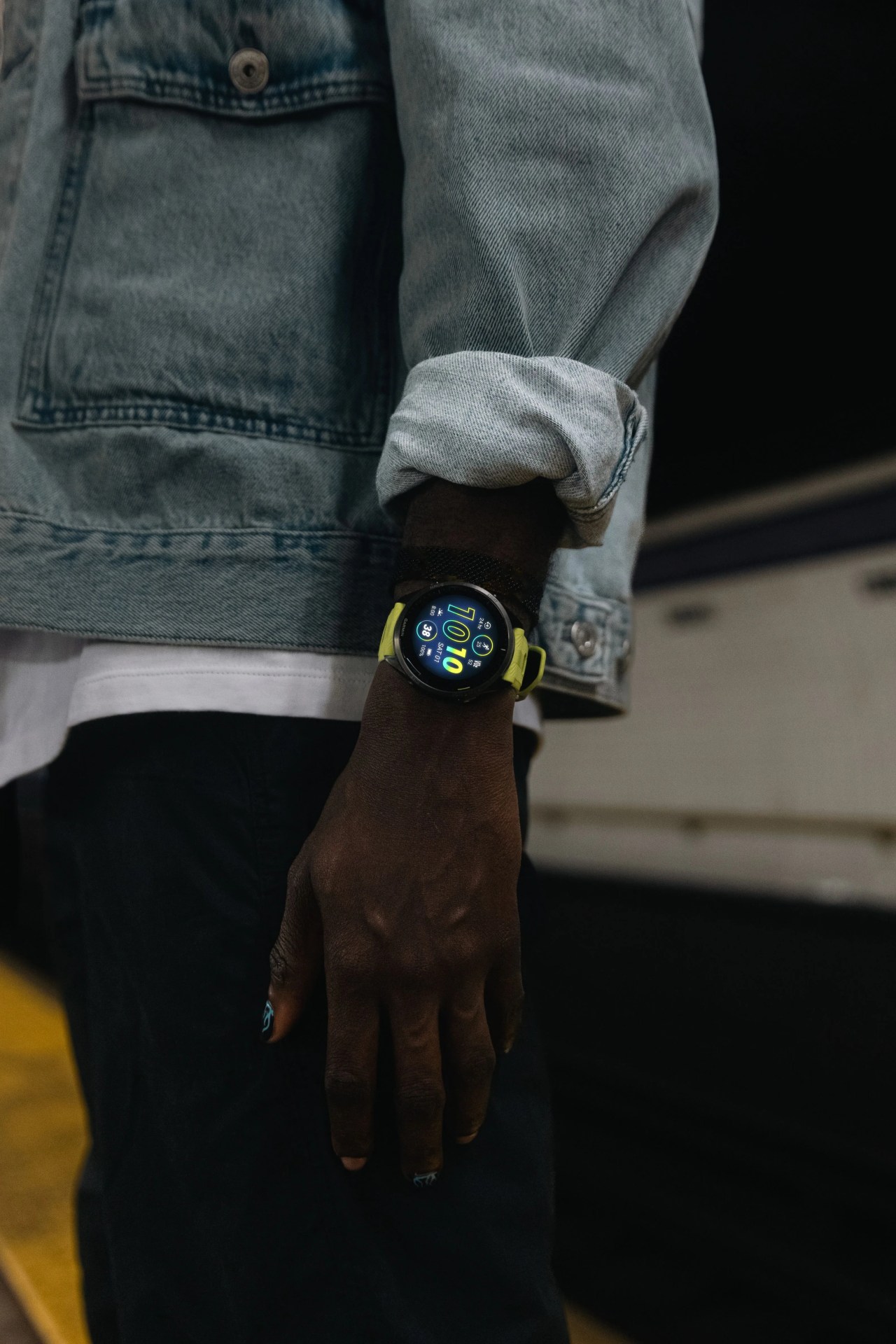 a person wearing a garmin watch