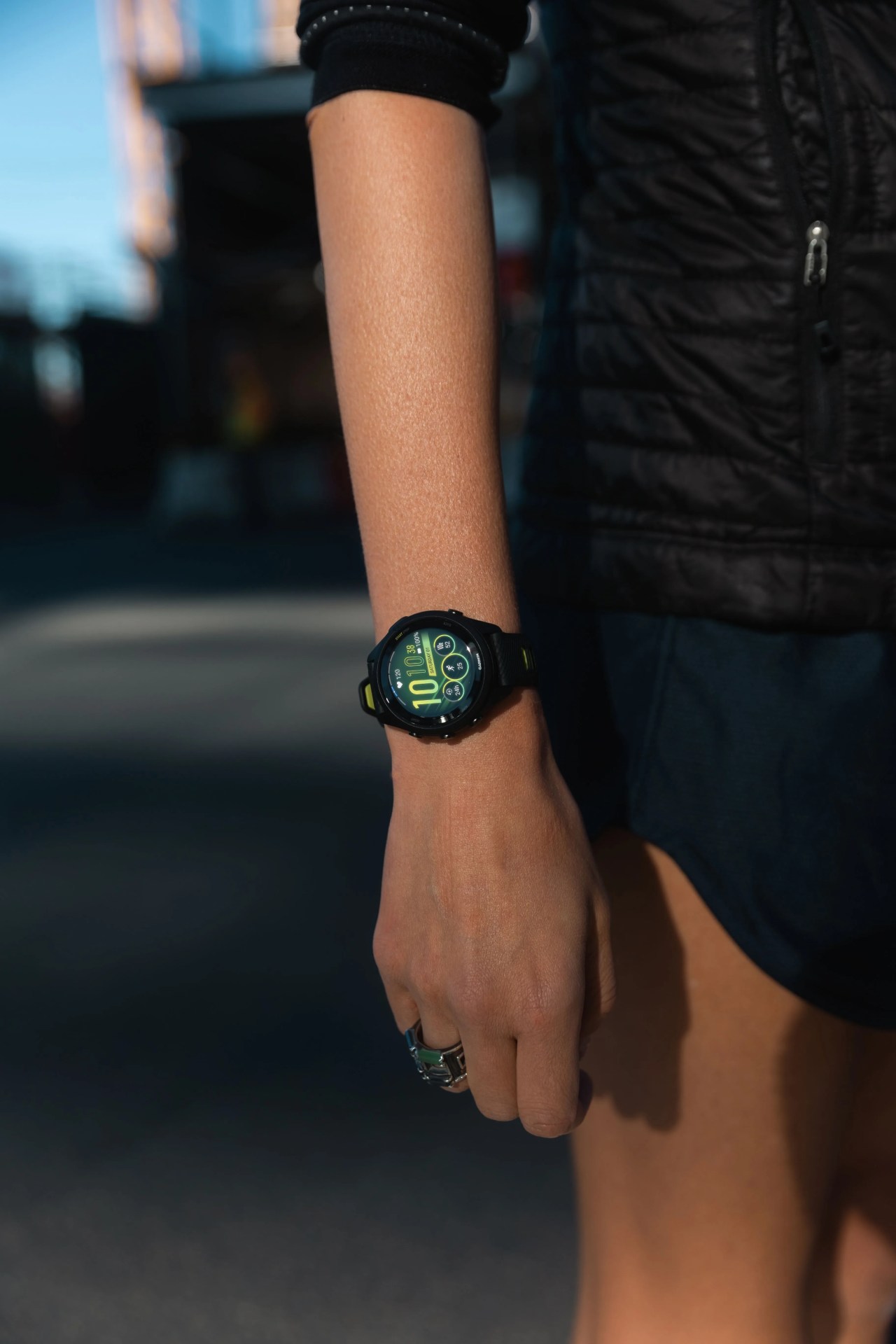 a person wearing a garmin watch