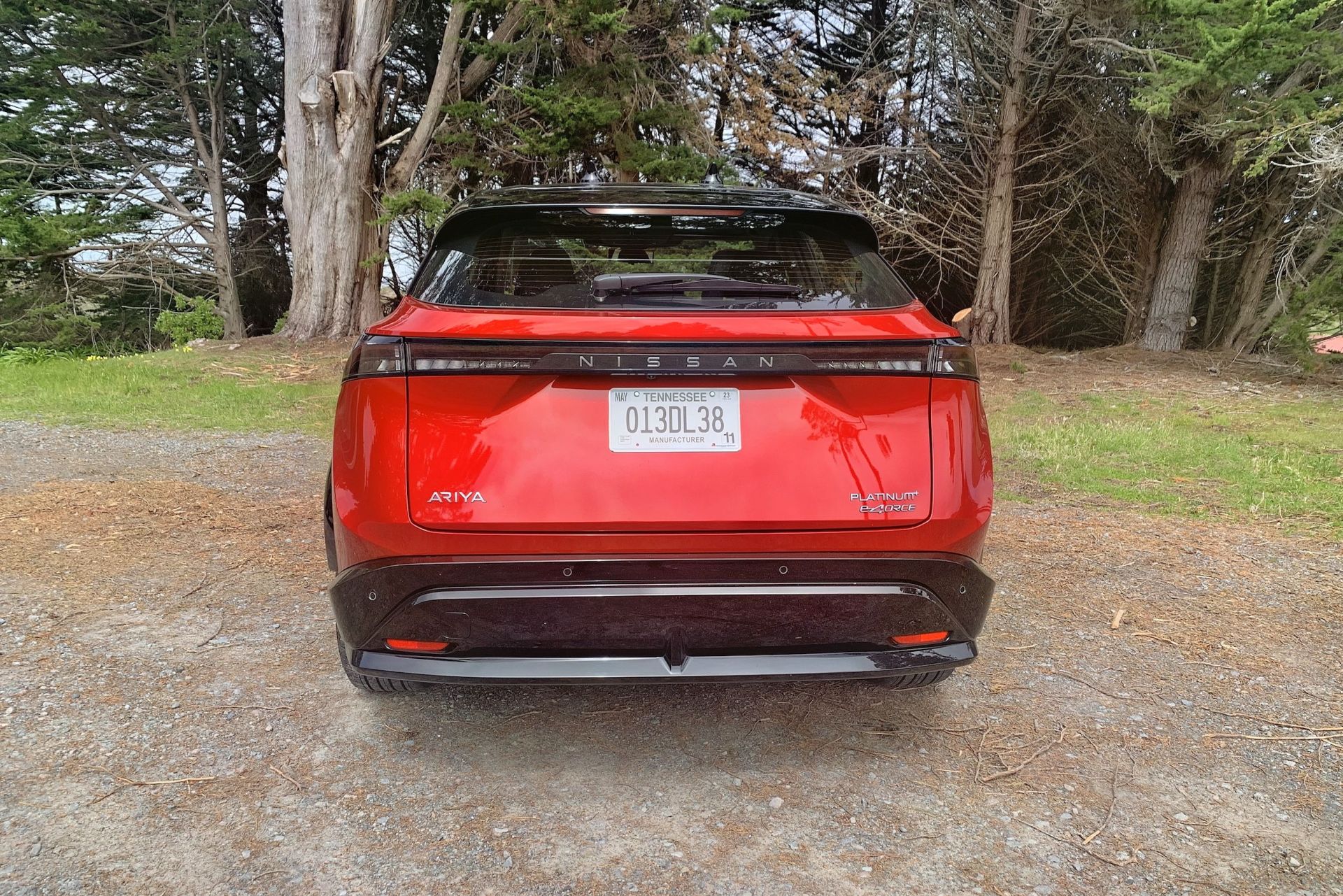 rear of nissan ariya in california woods