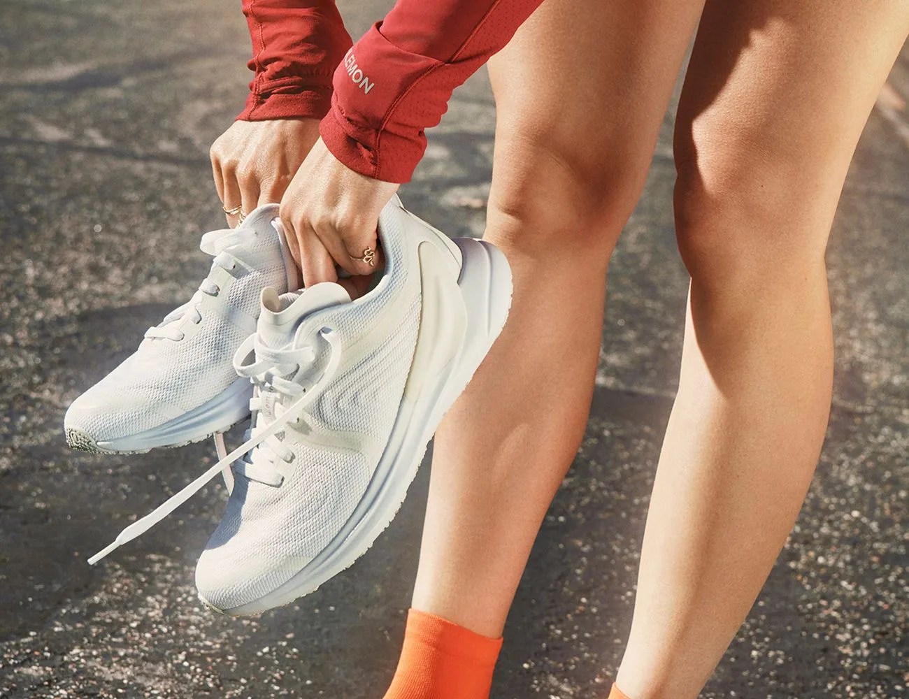a person holding lululemon blissfeel 2 shoes