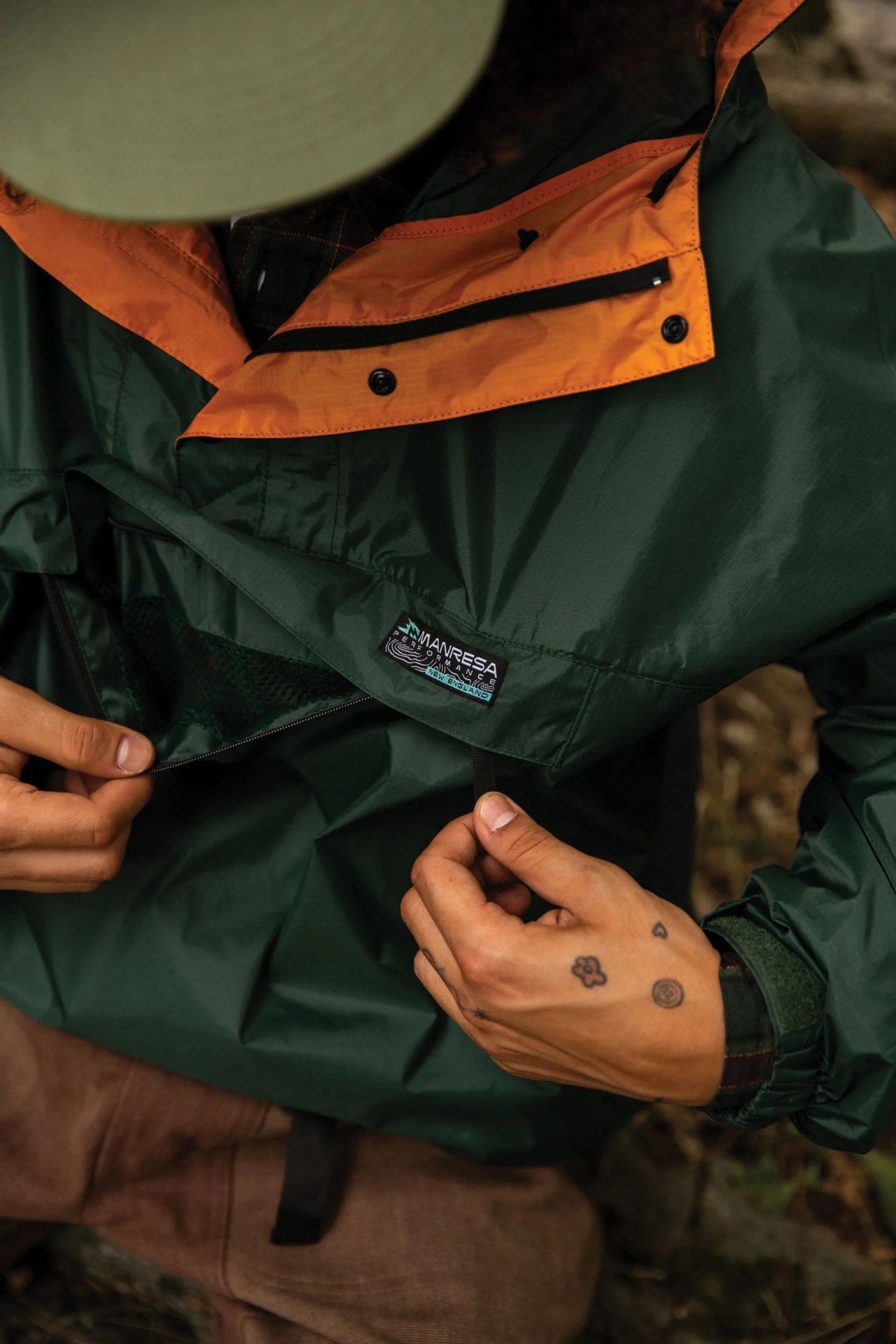 a man wearing a manresa half zip pullover