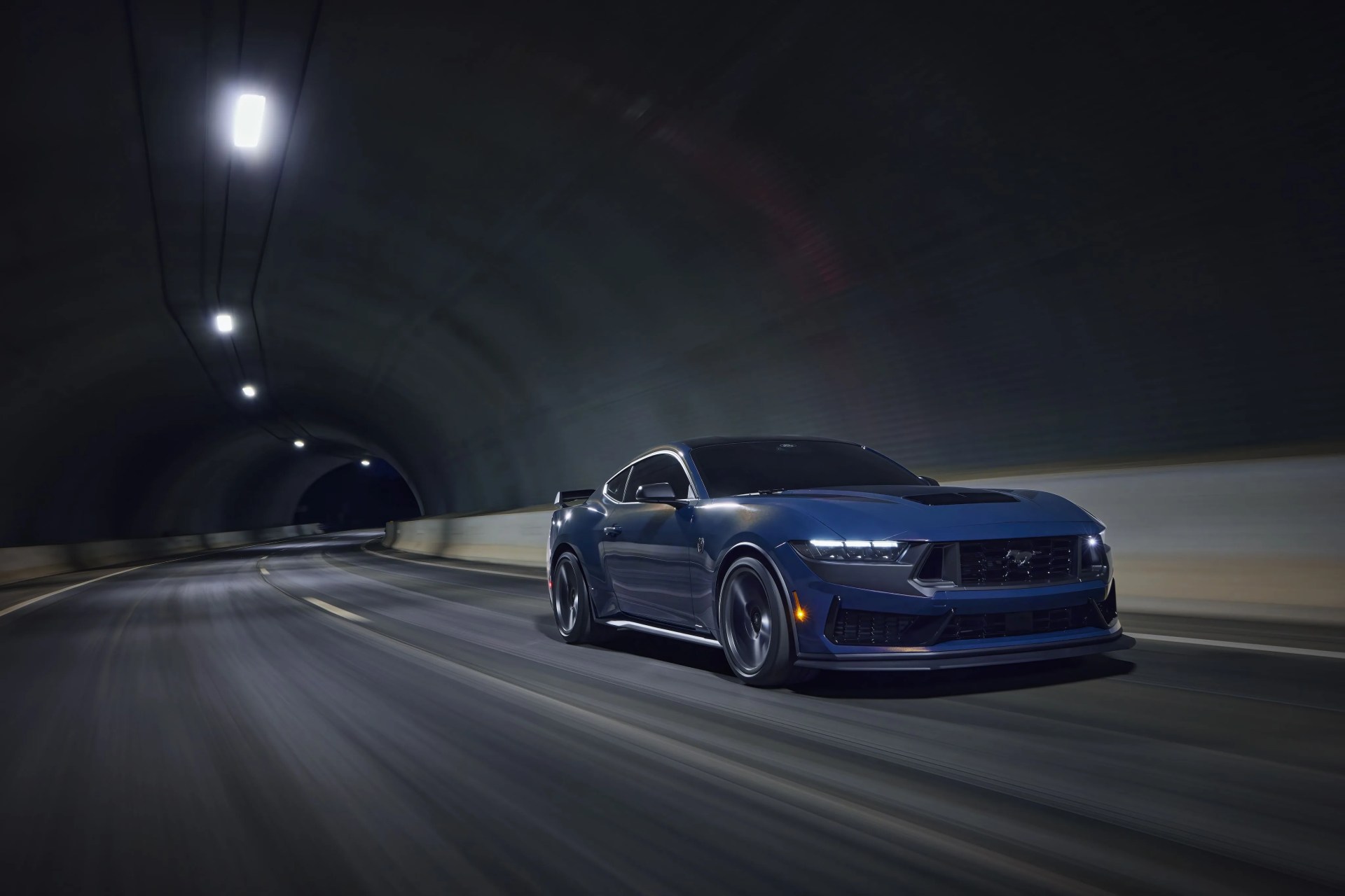 with sinister looks and a specially modified 50 liter v8 – the most powerful 50 liter v8 ever, projecting 500 horsepower – dark horse expands the mustang lineup and sets a new benchmark for american street and track performance that could only come in a mustang pre production vehicles shown closed course professional driver