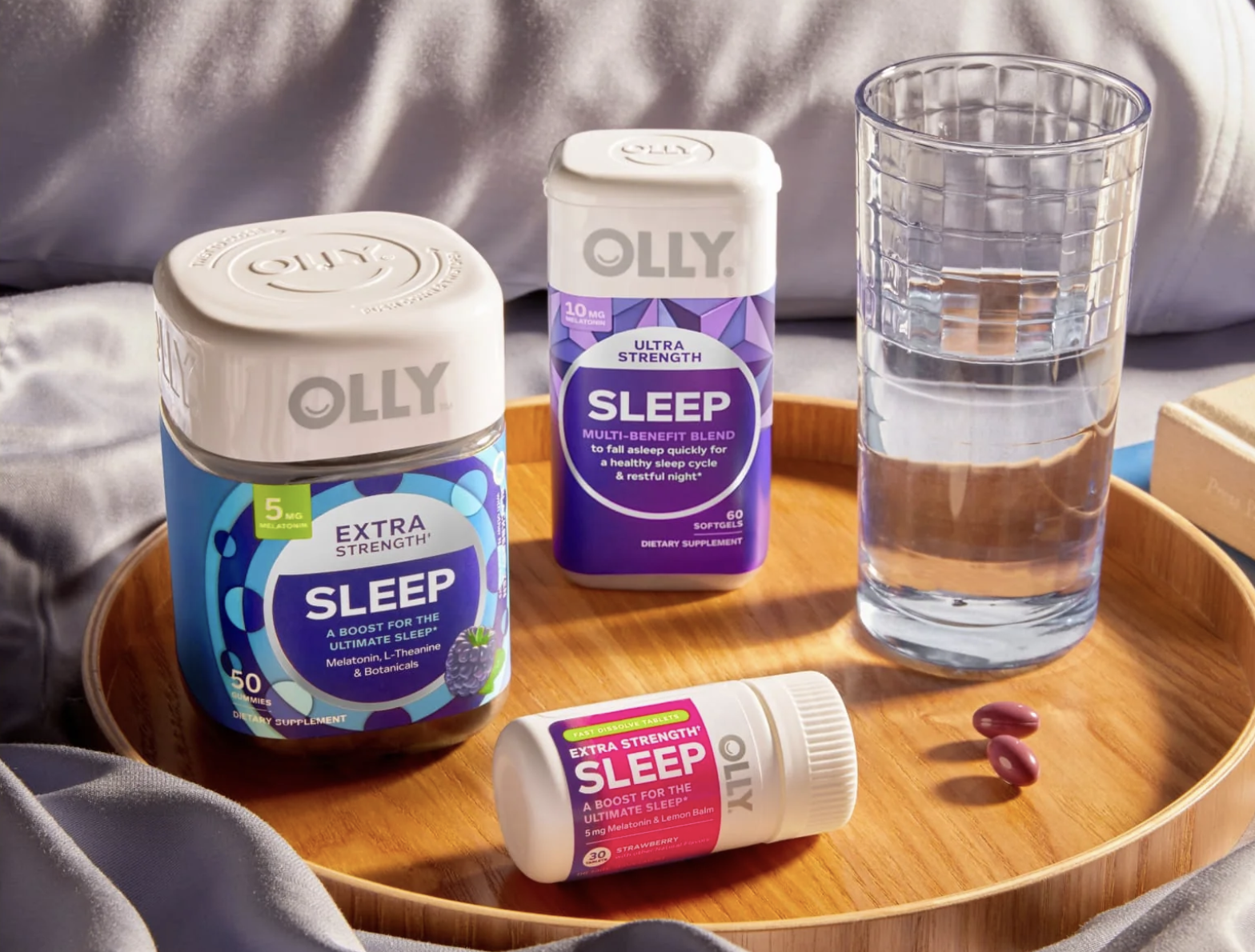 olly sleep gummies and tablets on tray