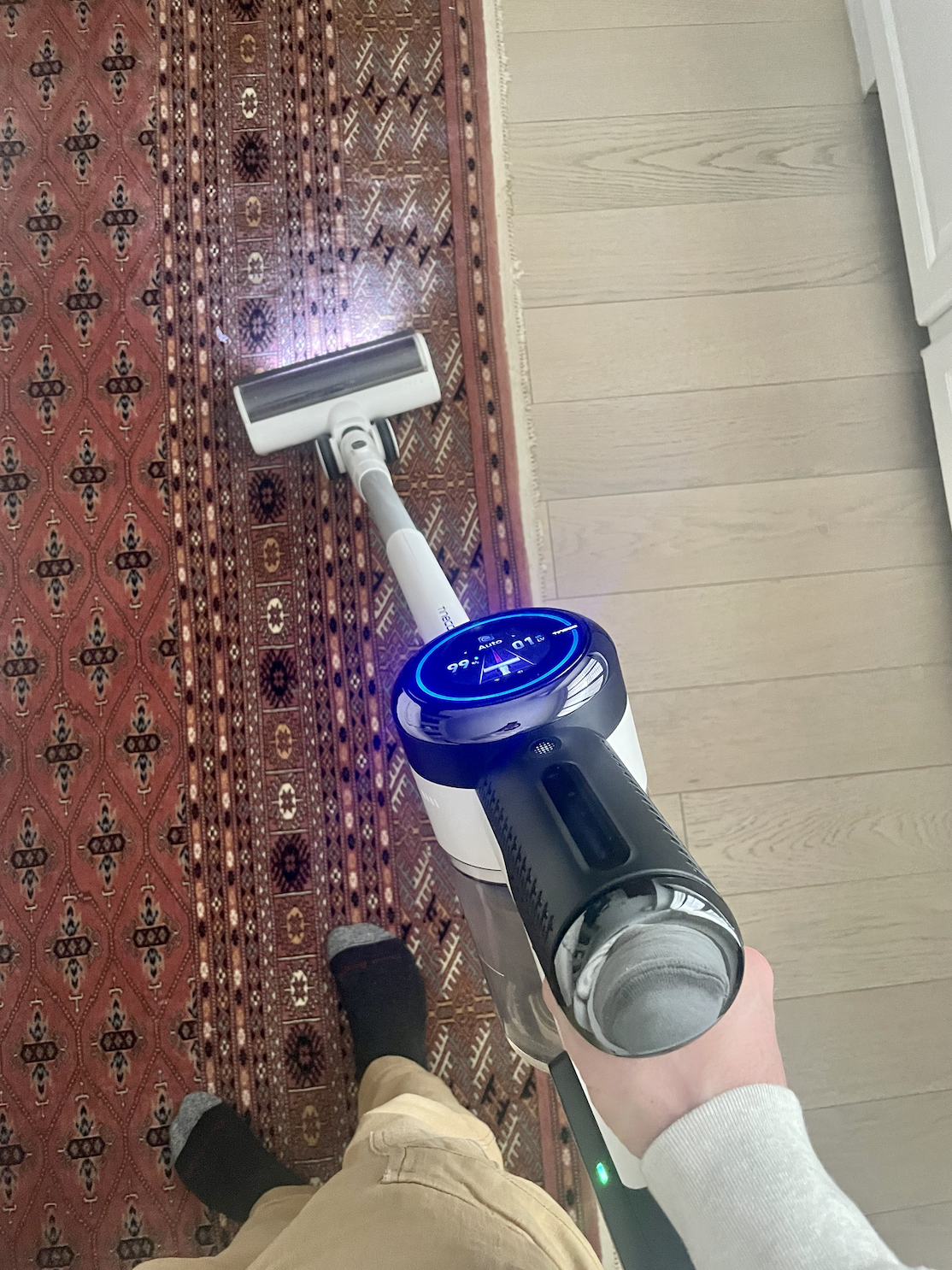 person vacuuming