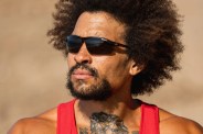 a man wearing tifosi sunglasses