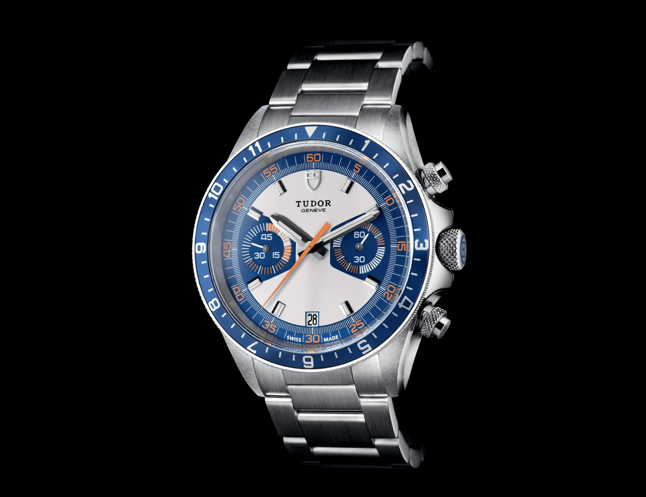 a silver watch with blue and orange accents on the dial