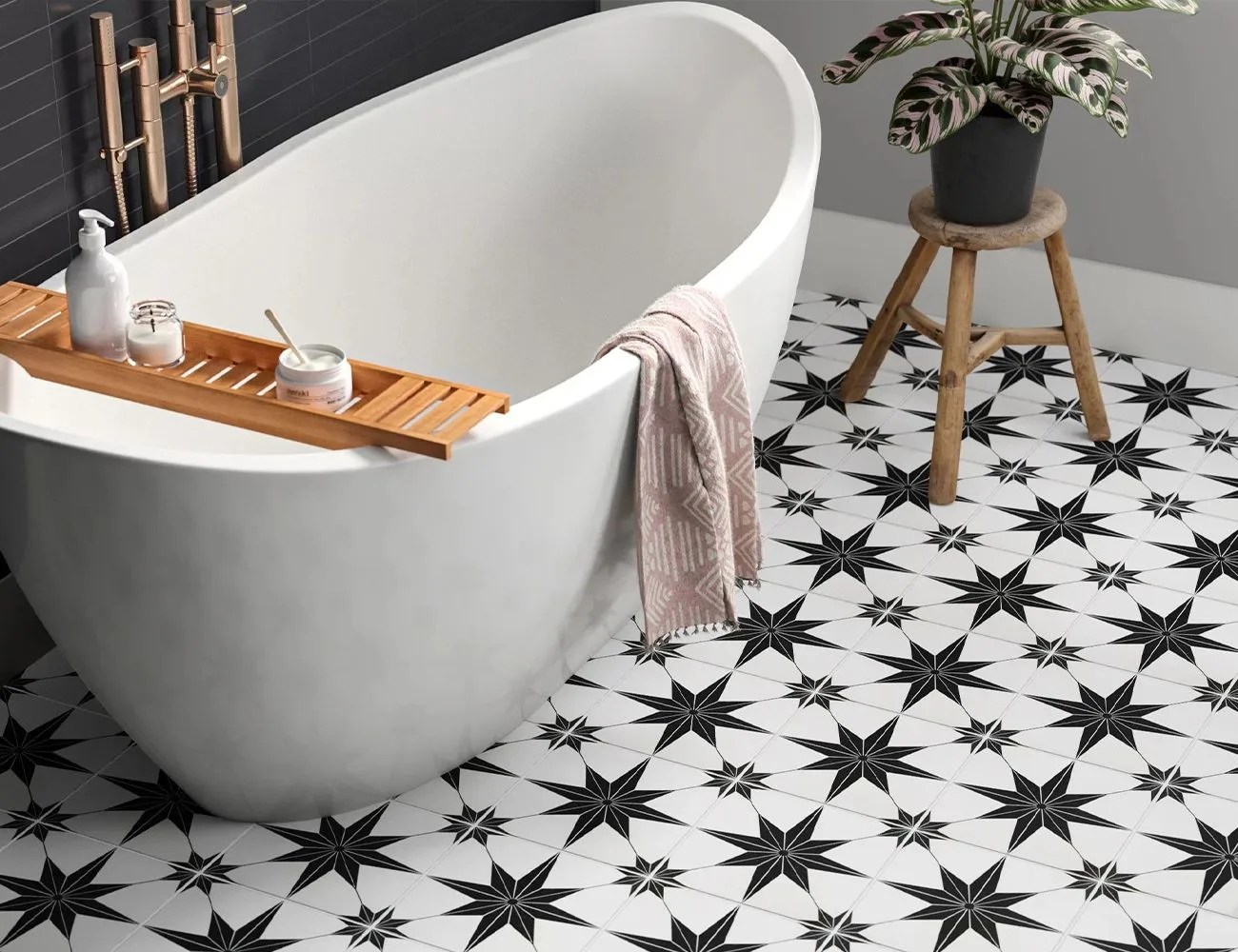 a bathtub in a tiled bathroom