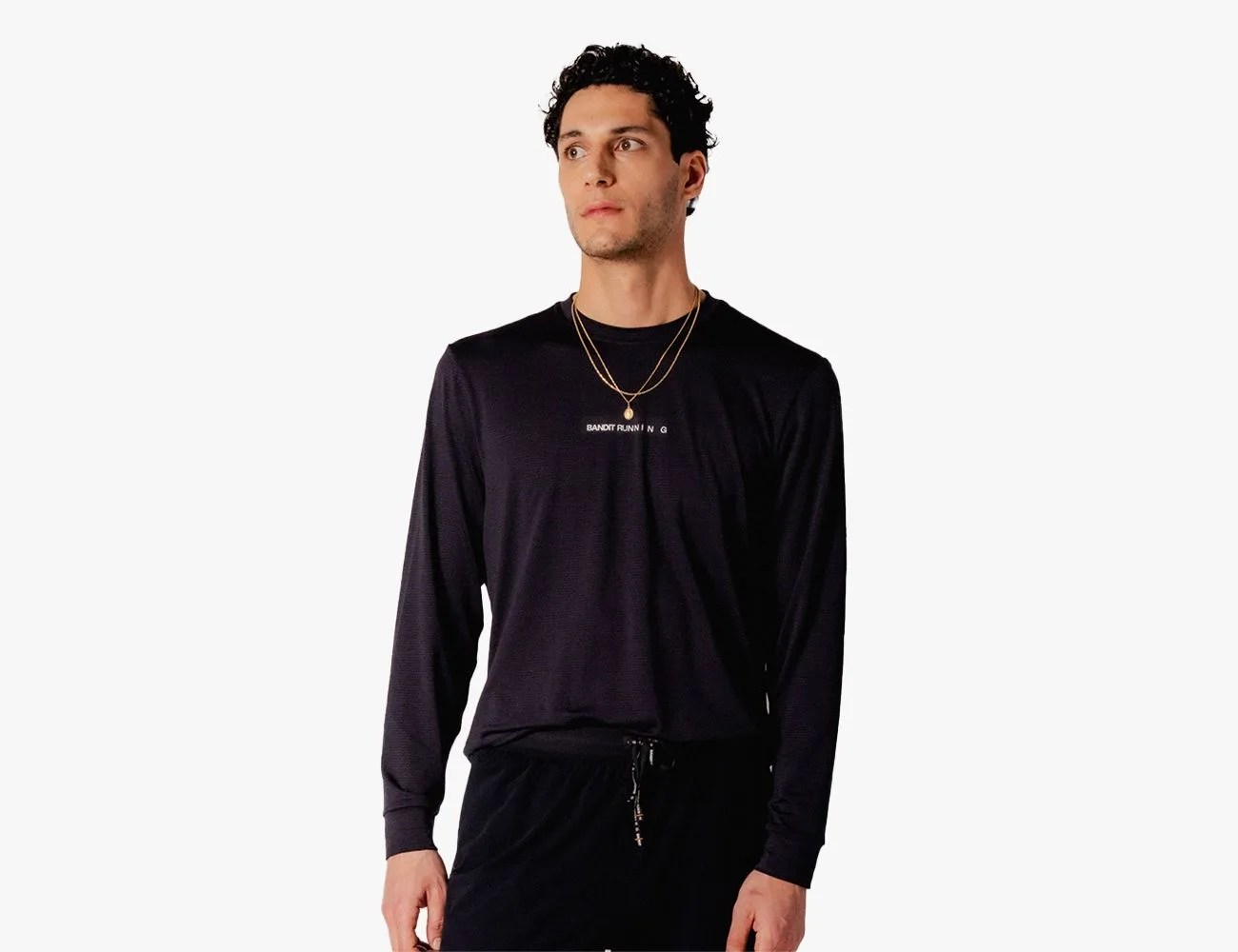 a man wearing a long sleeved running shirt