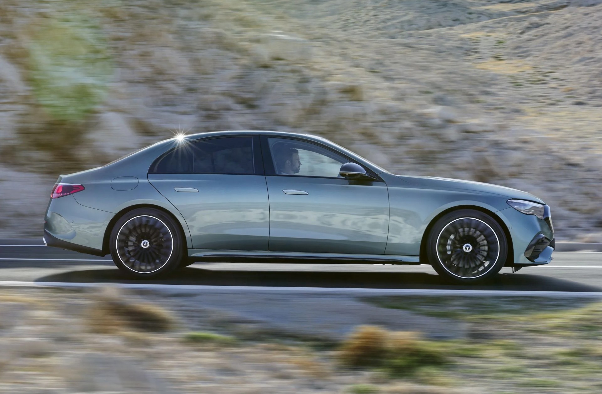 new mercedes benz e class side profile on the road