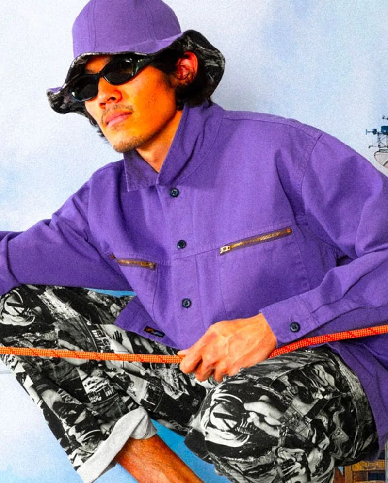 man wearing adsum x gramicci rock climbing gear