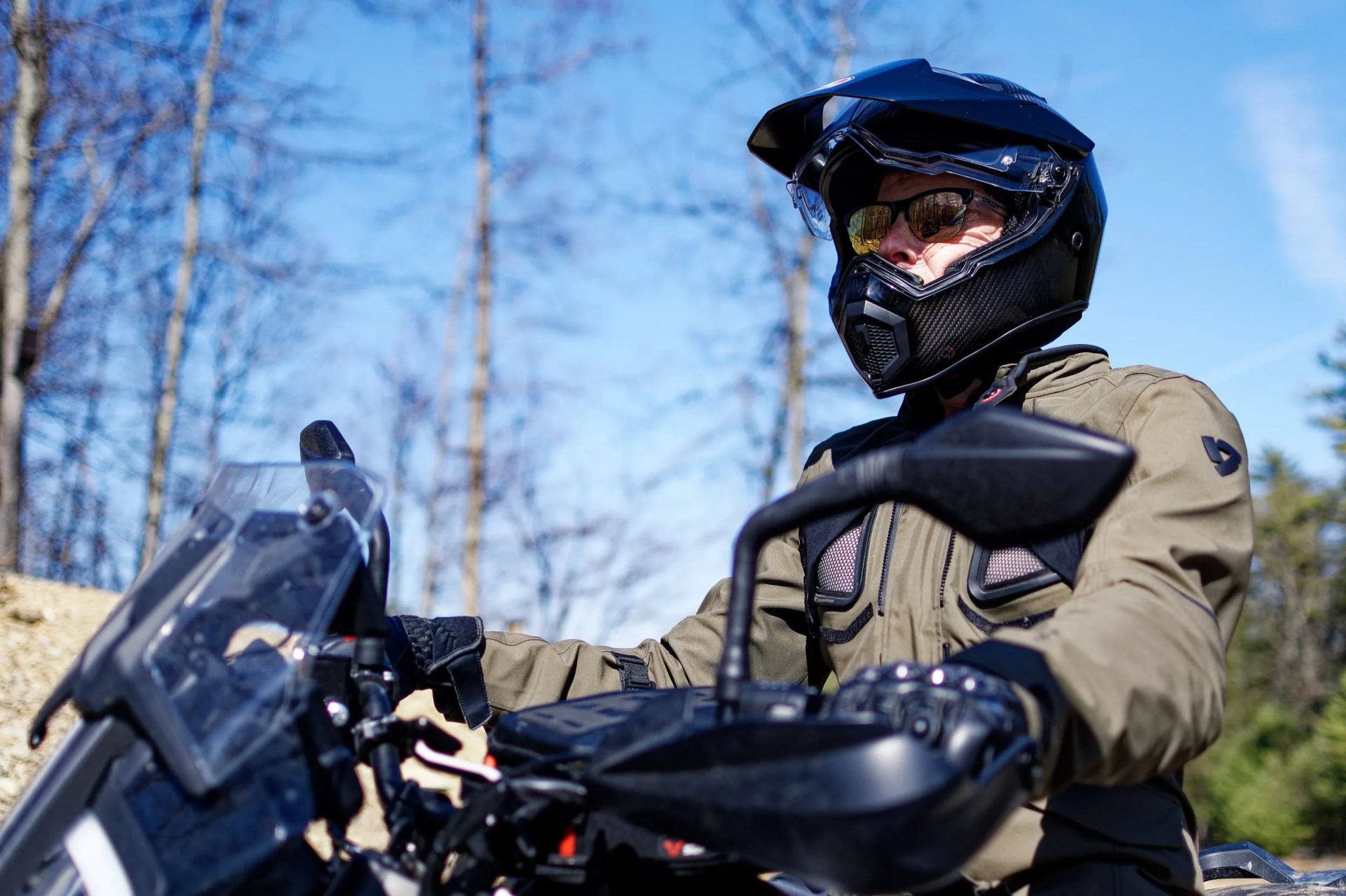 a man wearing a agv ax 9 helmet