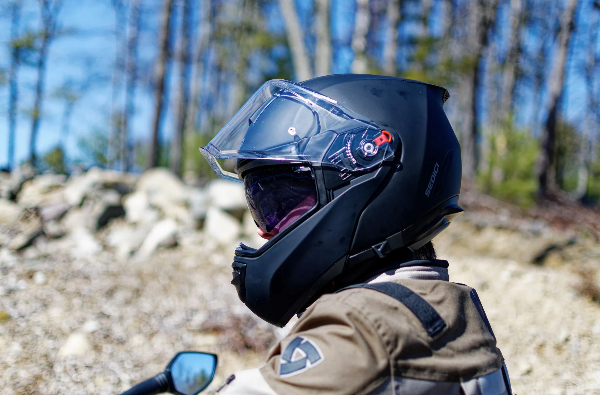 a man wearing a sedici helmet