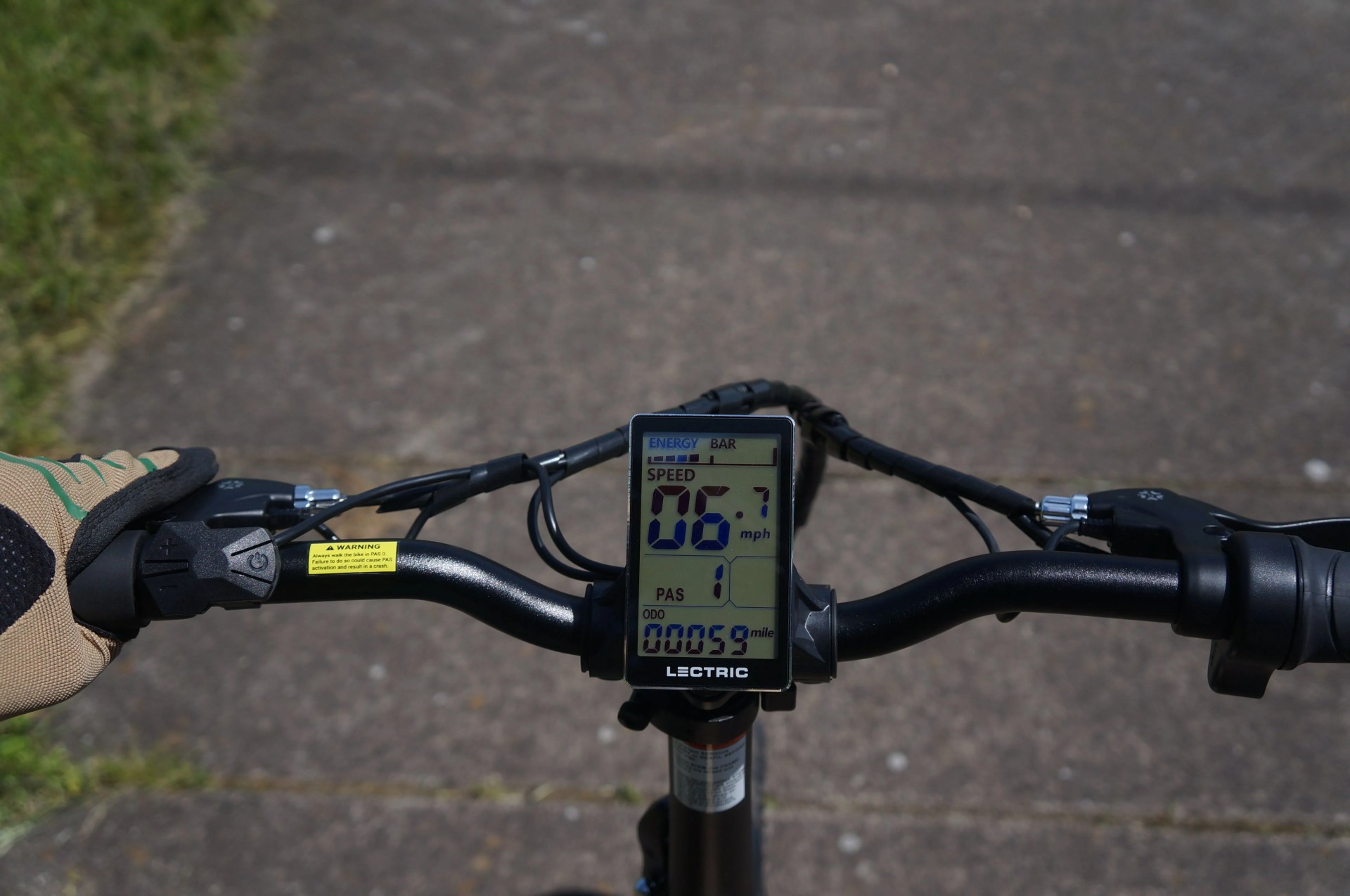 the lectric xp lite display on a bright day