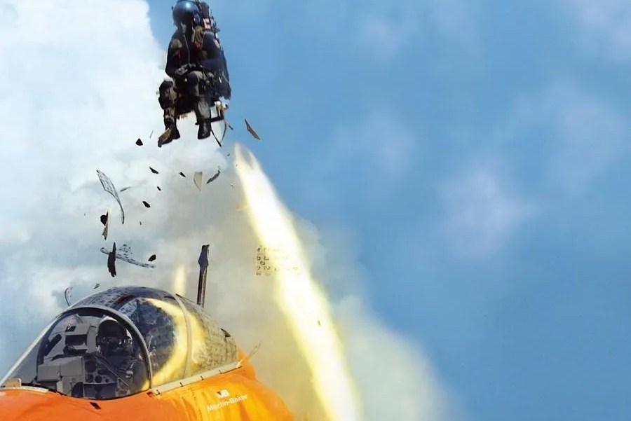 man being ejected from aircraft