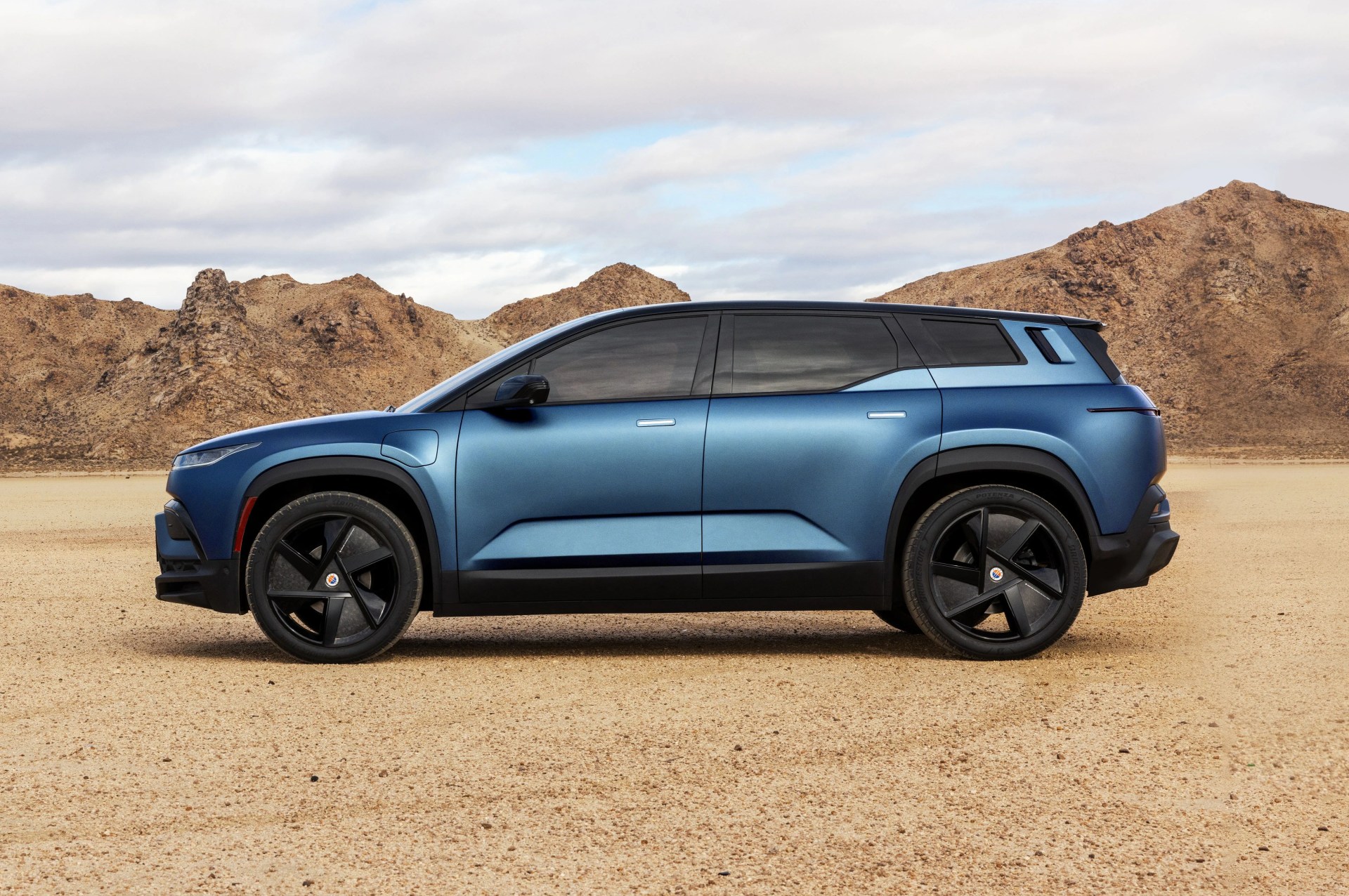 fisker ocean big sur blue matte in rabbit lake side profile